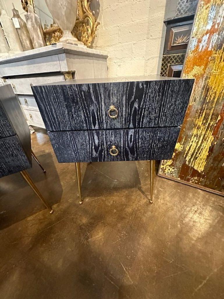 Handsome pair of cerused oak side table with brass accents. Great for a modern look!