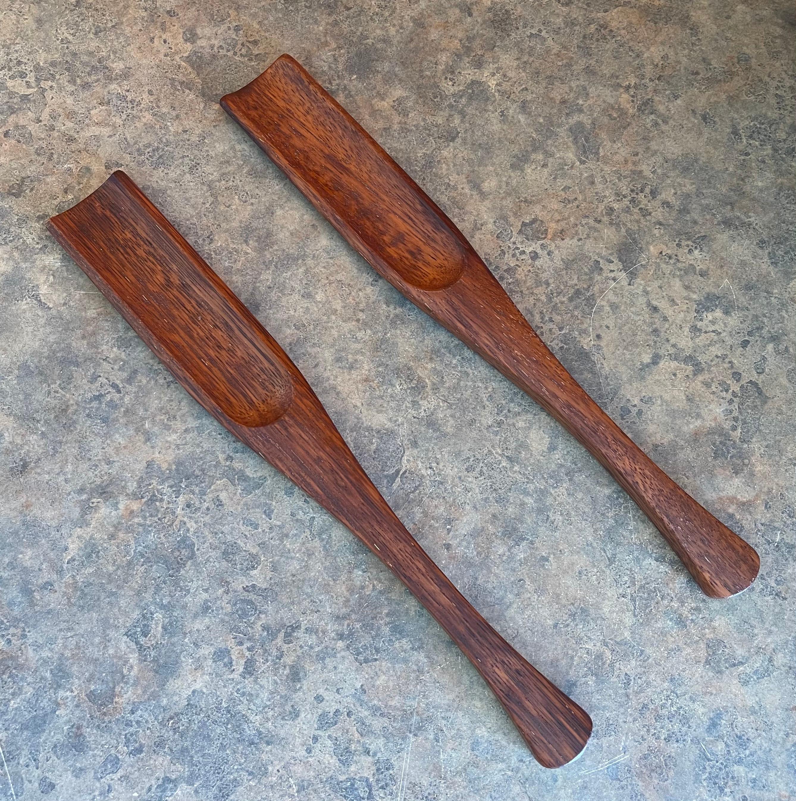 A nice pair of MCM teak salad servers by Jens Quistgaard for Dansk, circa 1970s. The servers are made of solid teak and they measure 13.25