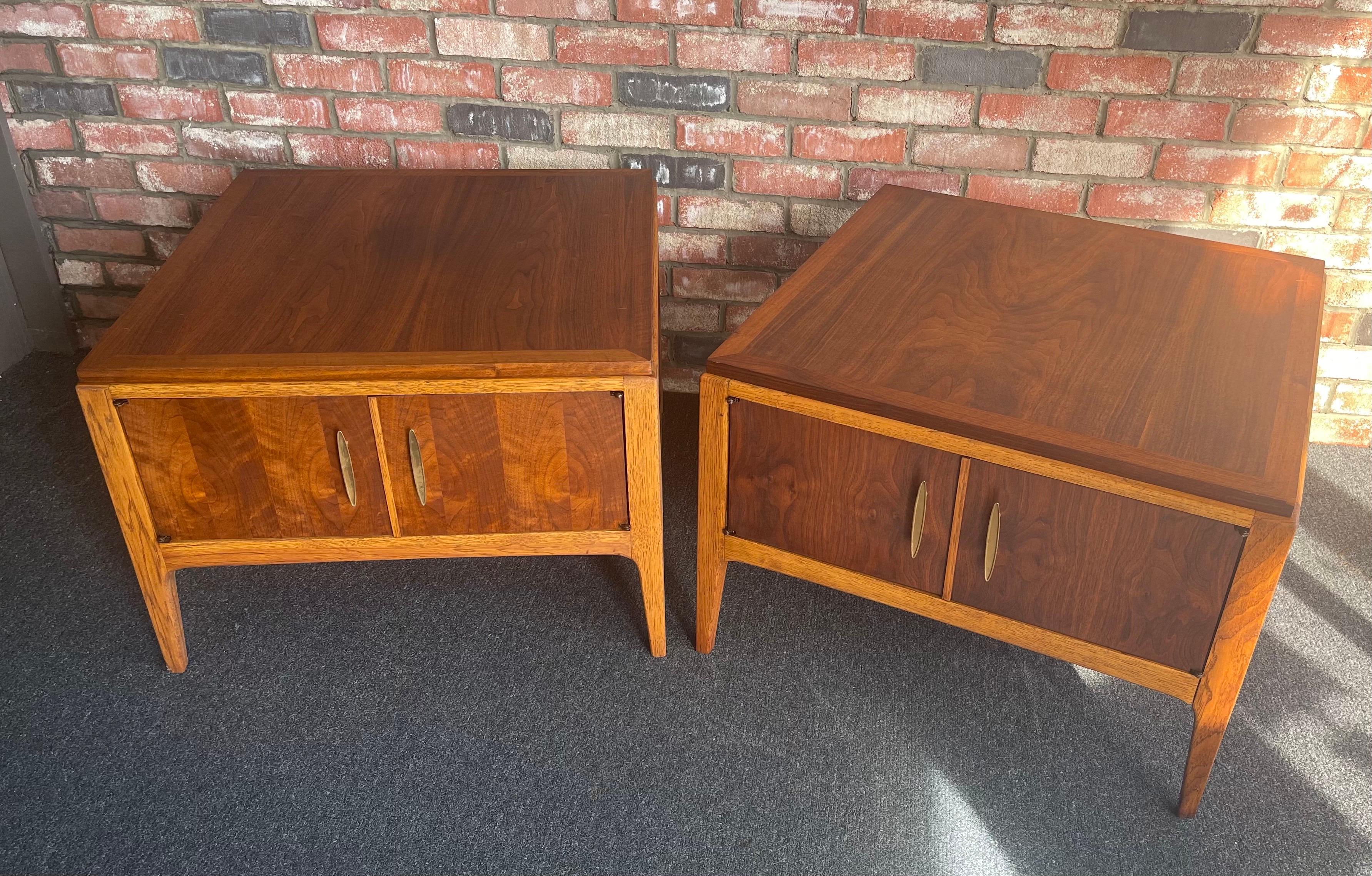 A very nice pair of American MCM walnut with oak accent end tables from the 