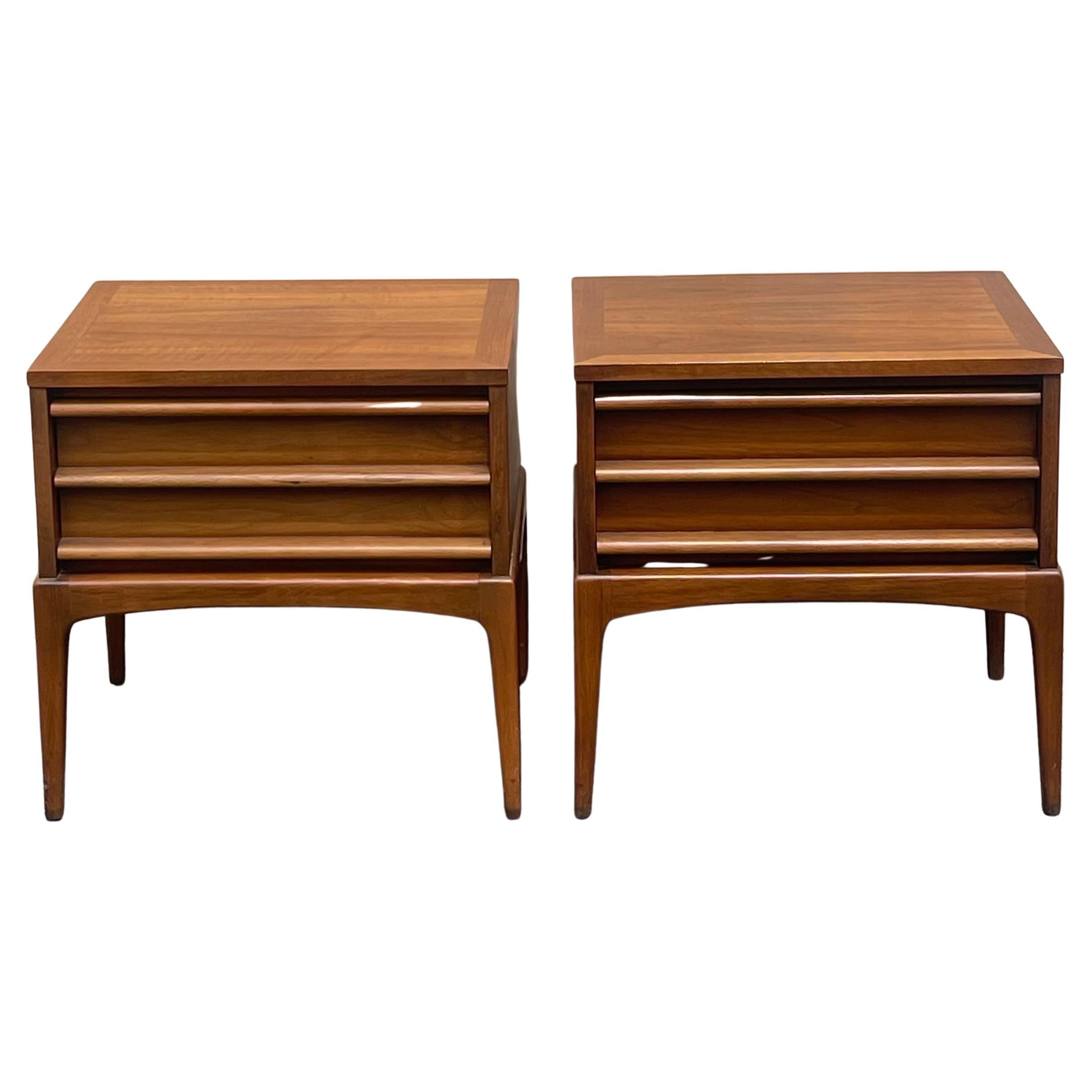 A very nice pair of American MCM walnut night stands from the 