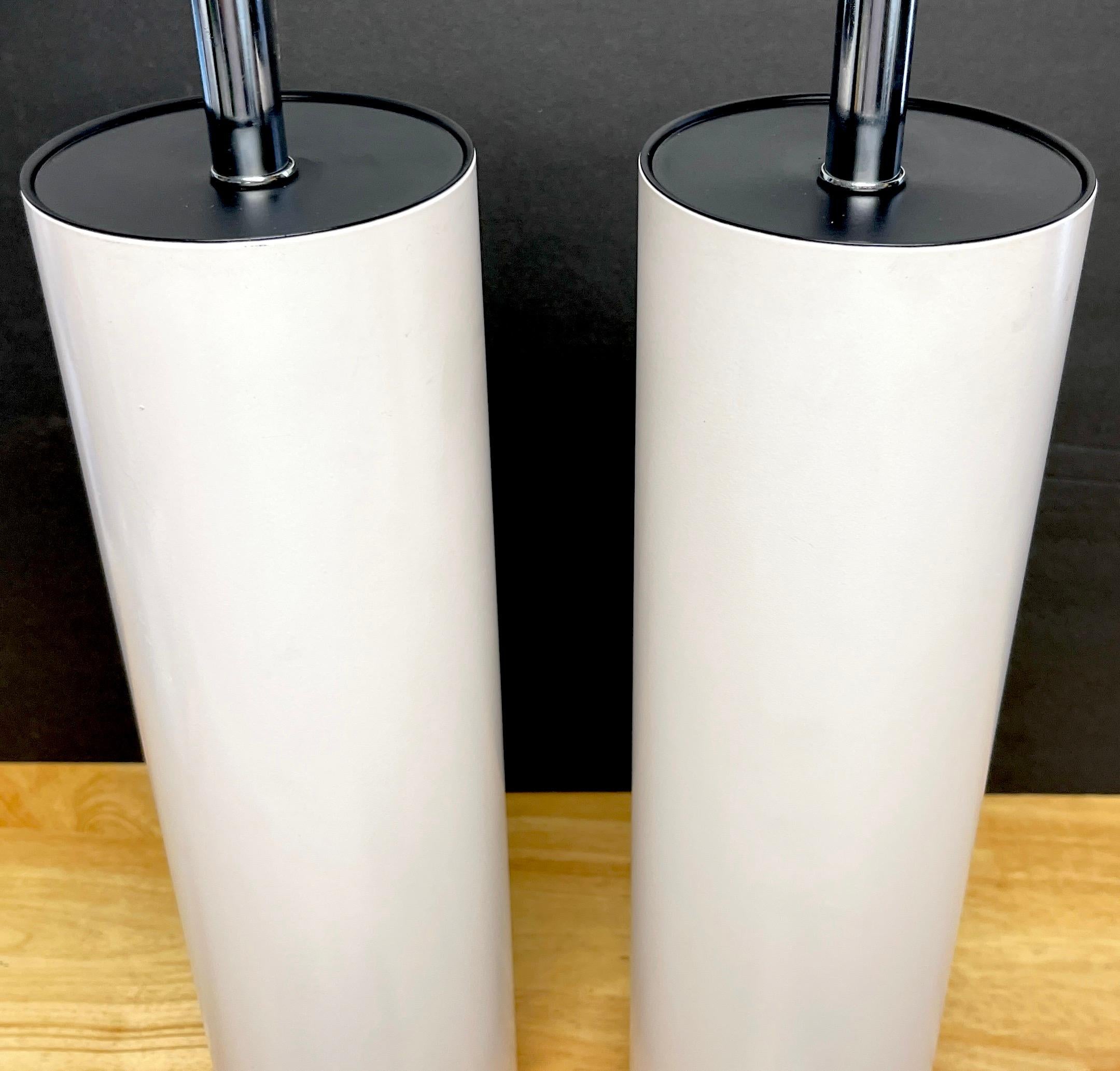 Metal Pair of MCM Walter Von Nessen Tall White Enameled Column Lamps For Sale