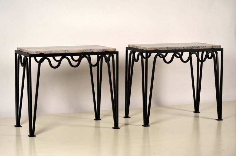 Pair of 'Méandre' black iron and silver travertine side tables by Design Frères.