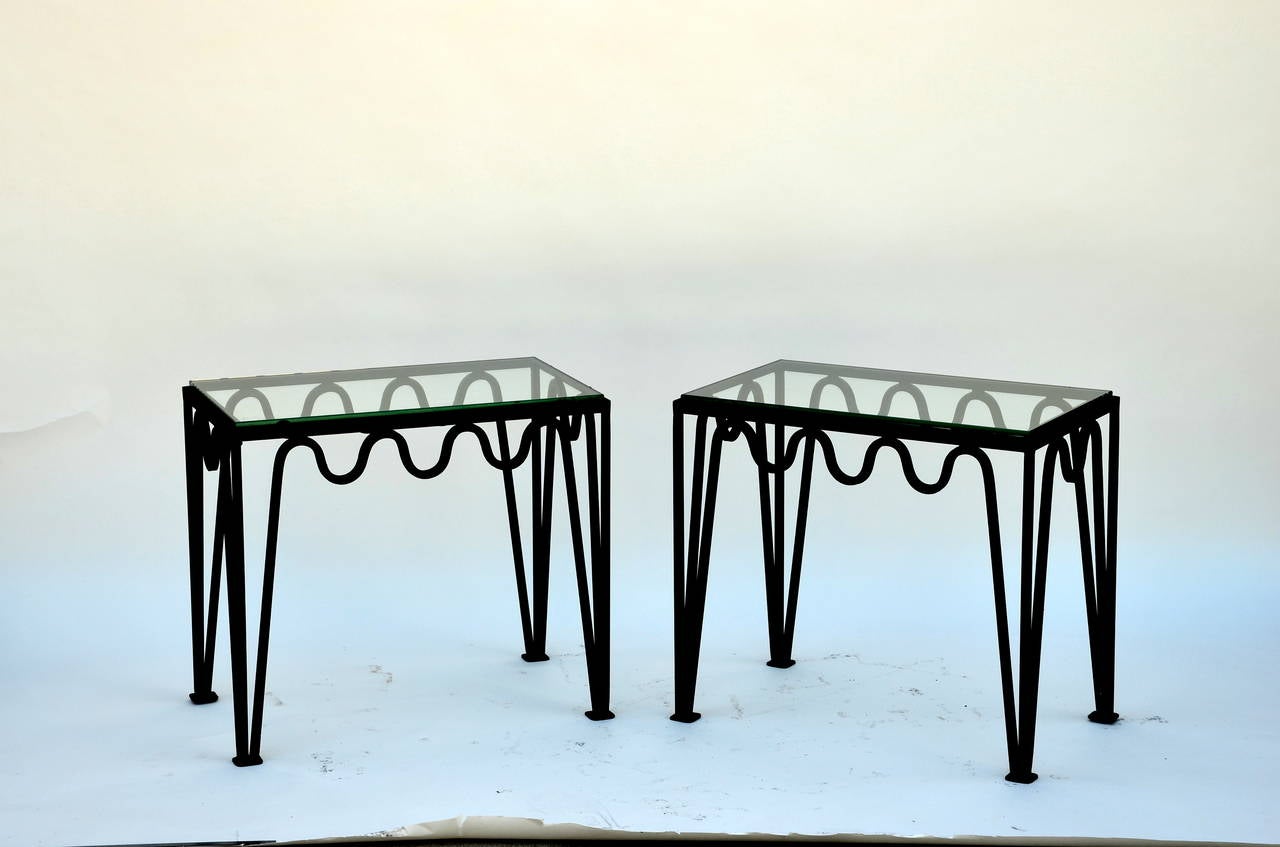 Pair of Méandre™ blackened steel and glass side tables by DESIGN FRÈRES.

Chic and understated.

Shown for size on the last picture.