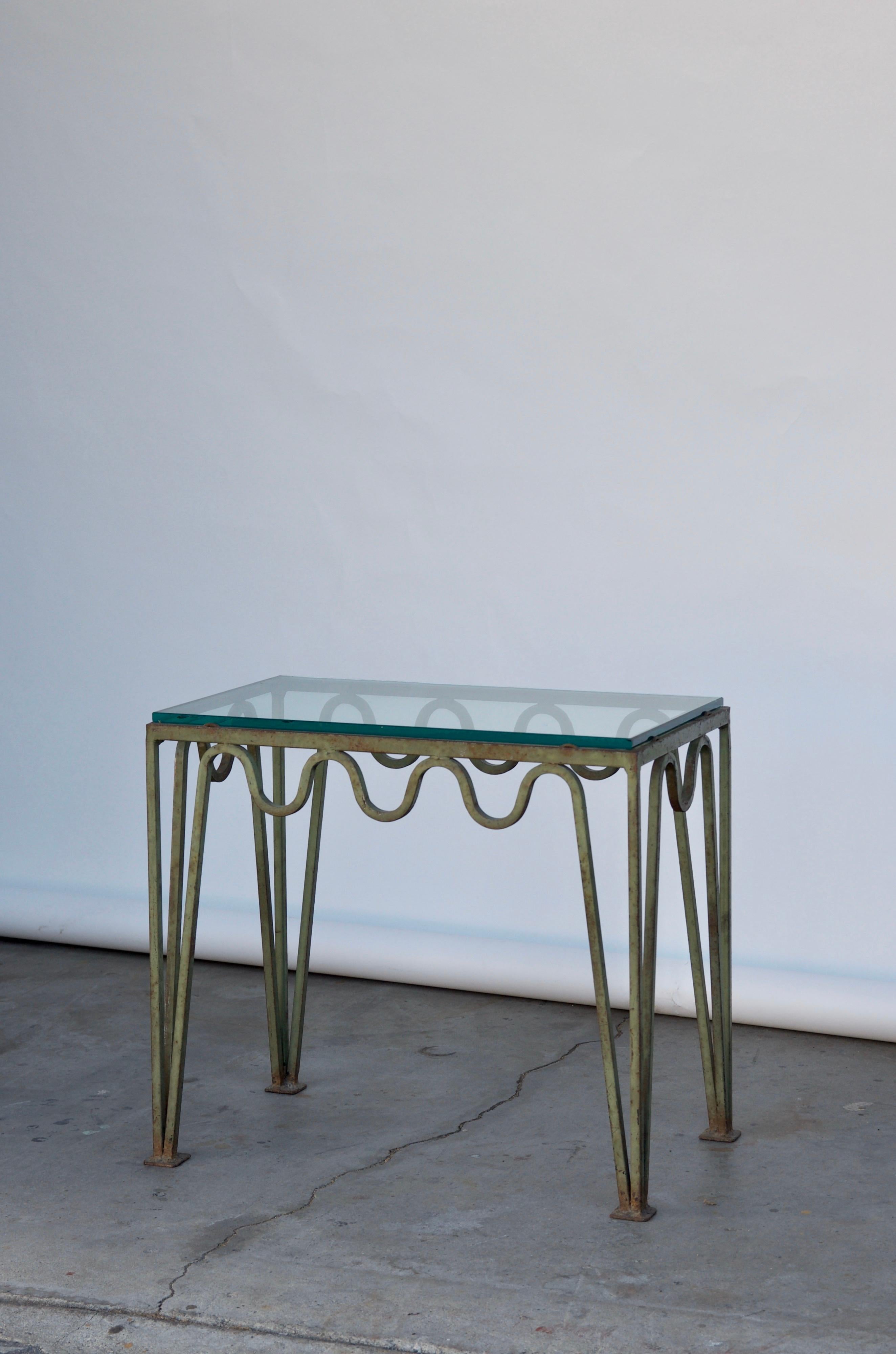 Pair of 'Méandre'™ verdigris steel and glass side tables by Design Frères®.