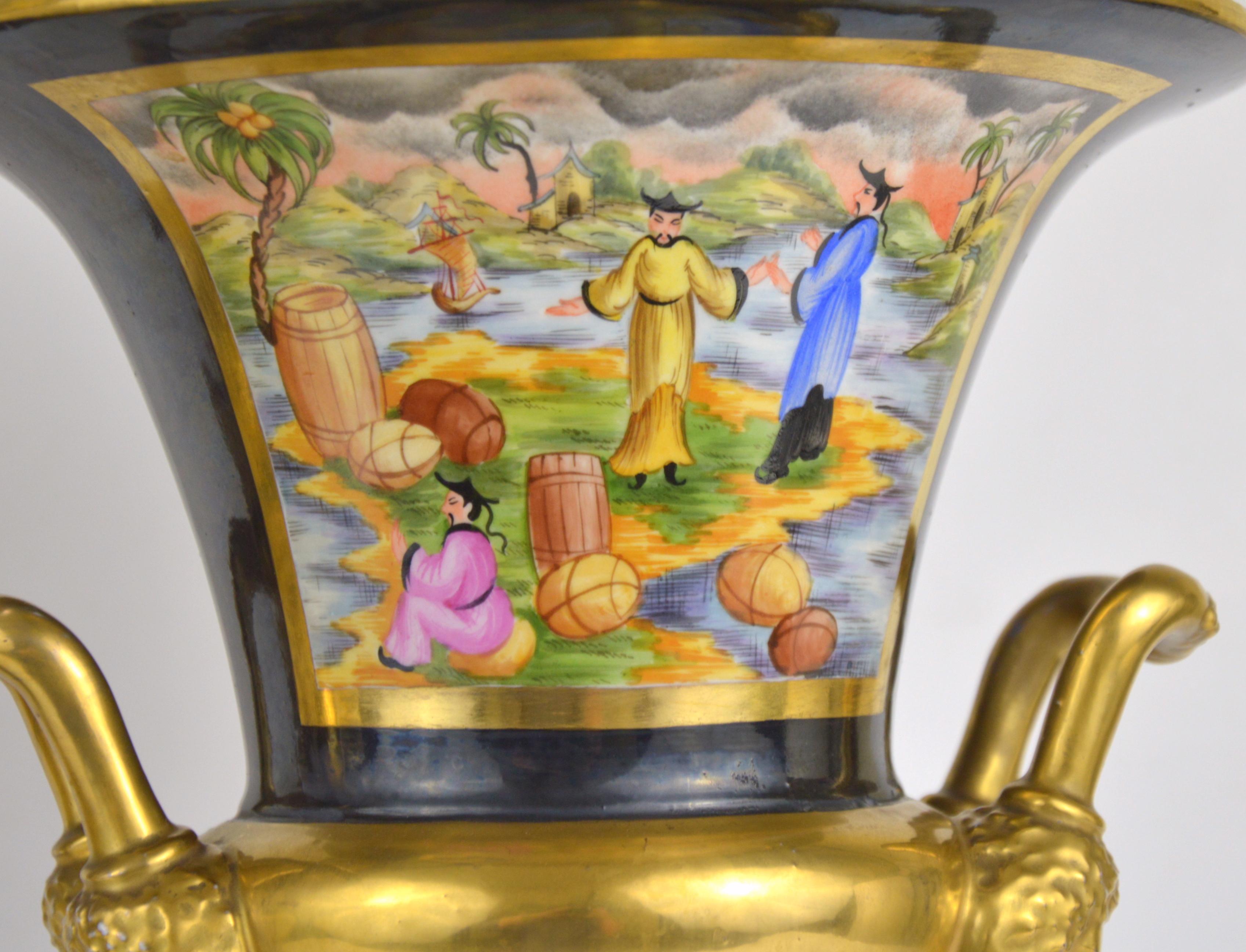 Pair of Medici porcelain vases. chinoiserie style hand painted overglaze decoration. Bearded-head mascarons shaped handles.
Measures: Height 32 cm, diameter 24 cm.
Condition report: Some wear to the gilding, small manufacturing defects (see the