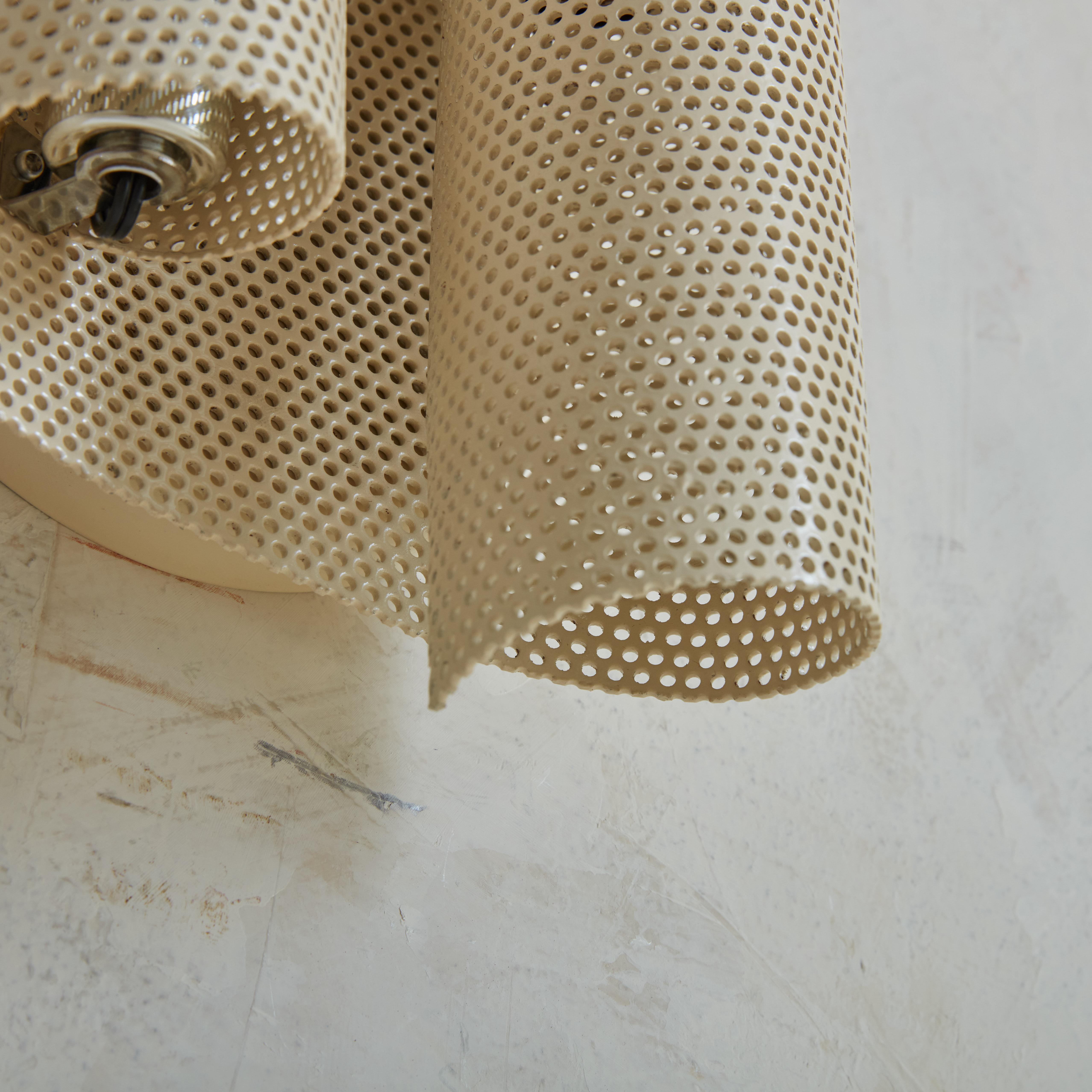 Pair of Medium Perforated Metal Sconces in the Style of Mathieu Matégot For Sale 1