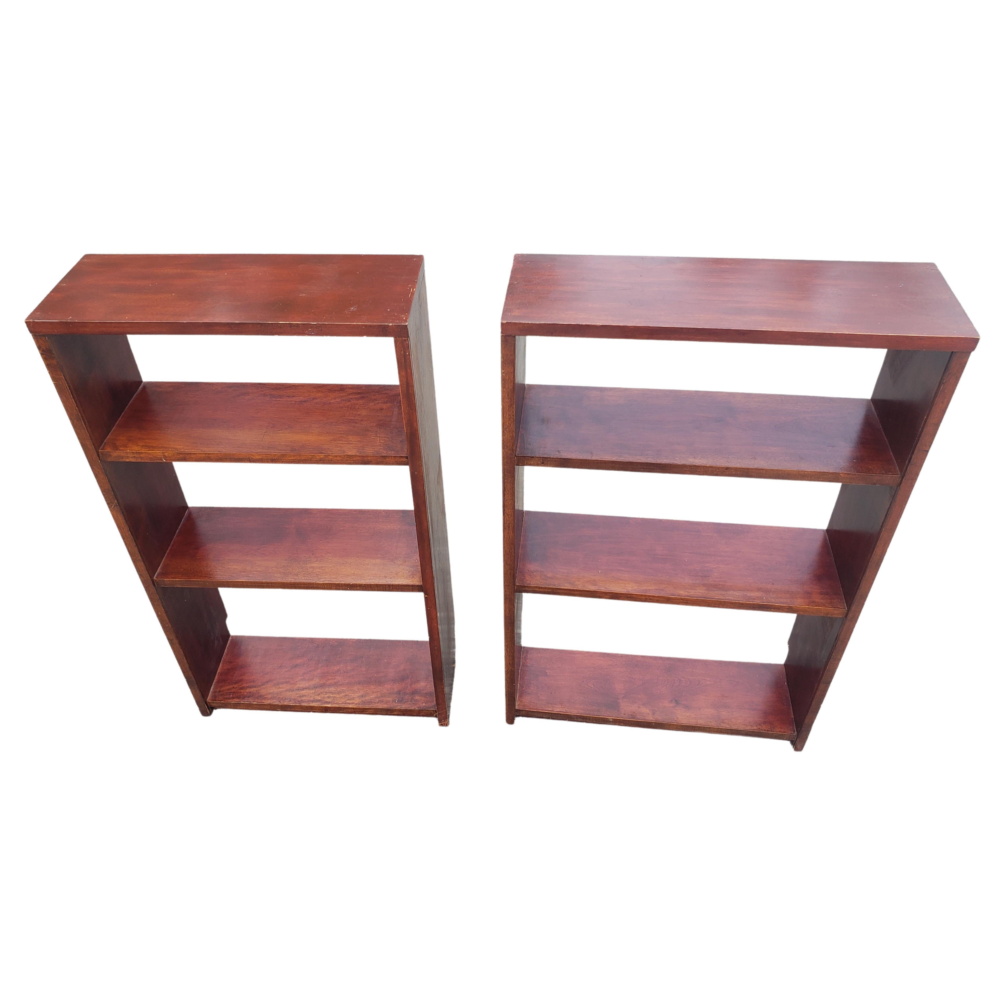 Pair of handcrafted solid cherry open bookcases from the late 20th century. Good vintage condition.. Measure 22