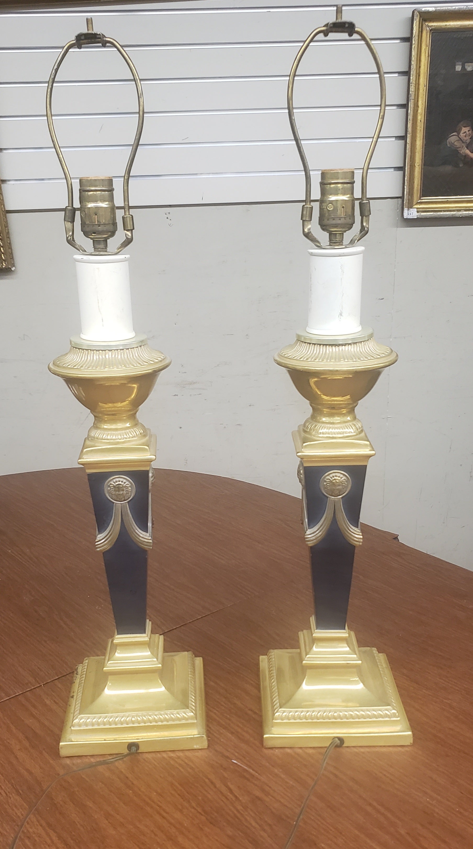 Pair of Medusa Empire style ebonized & enameled brass finished table lamps with famous Medusa medallions on 4 sides.
Measures 6.5