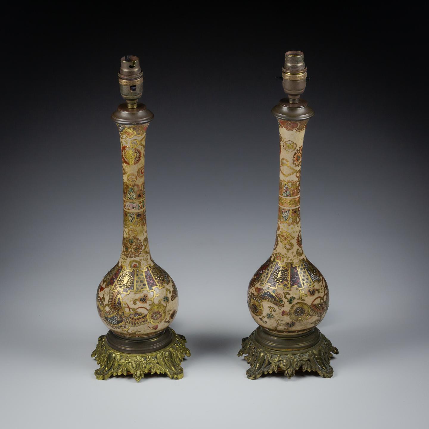 Pair of Porcelain Satsuma Bottle Vase Lamps. impressive condition, most likely converted as lamps in mid 20th Century using excellent quality bronze mounts.

Japan, Meiji Period, Circa 1880.

Rewired with antique style cord flex and PAT tested to UK