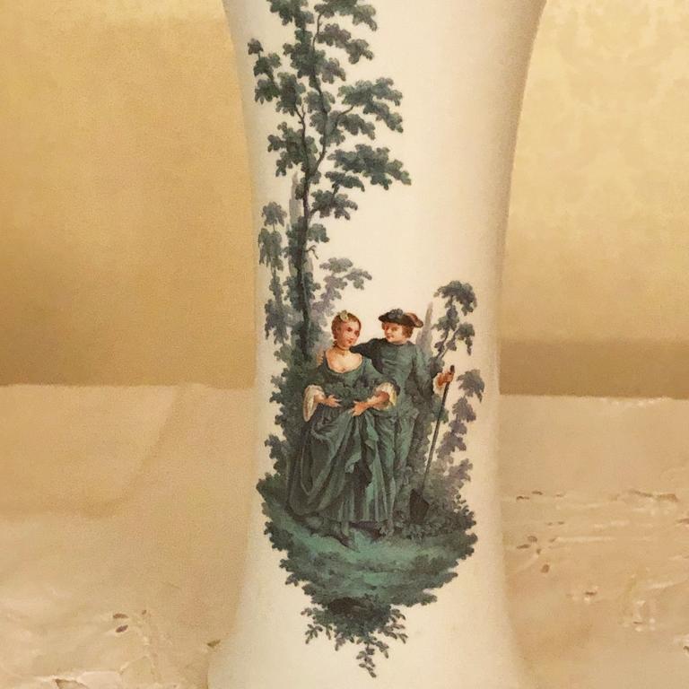 Pair of very special Meissen vases with Watteau scenes of lovers. These would be a beautiful decoration for your home on your mantle, on a center table or with a mirror behind them. They have scenes of lovers on all four sides, so they will look