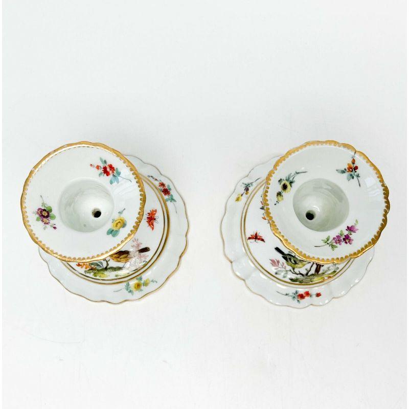 Pair of Meissen Marcolini Period Germany Ornithological Porcelain candlesticks

circa 1800. A white ground with hand painted birds and flowers throughout, gilt accents. Meissen Marcolini mark to the underside.

Additional