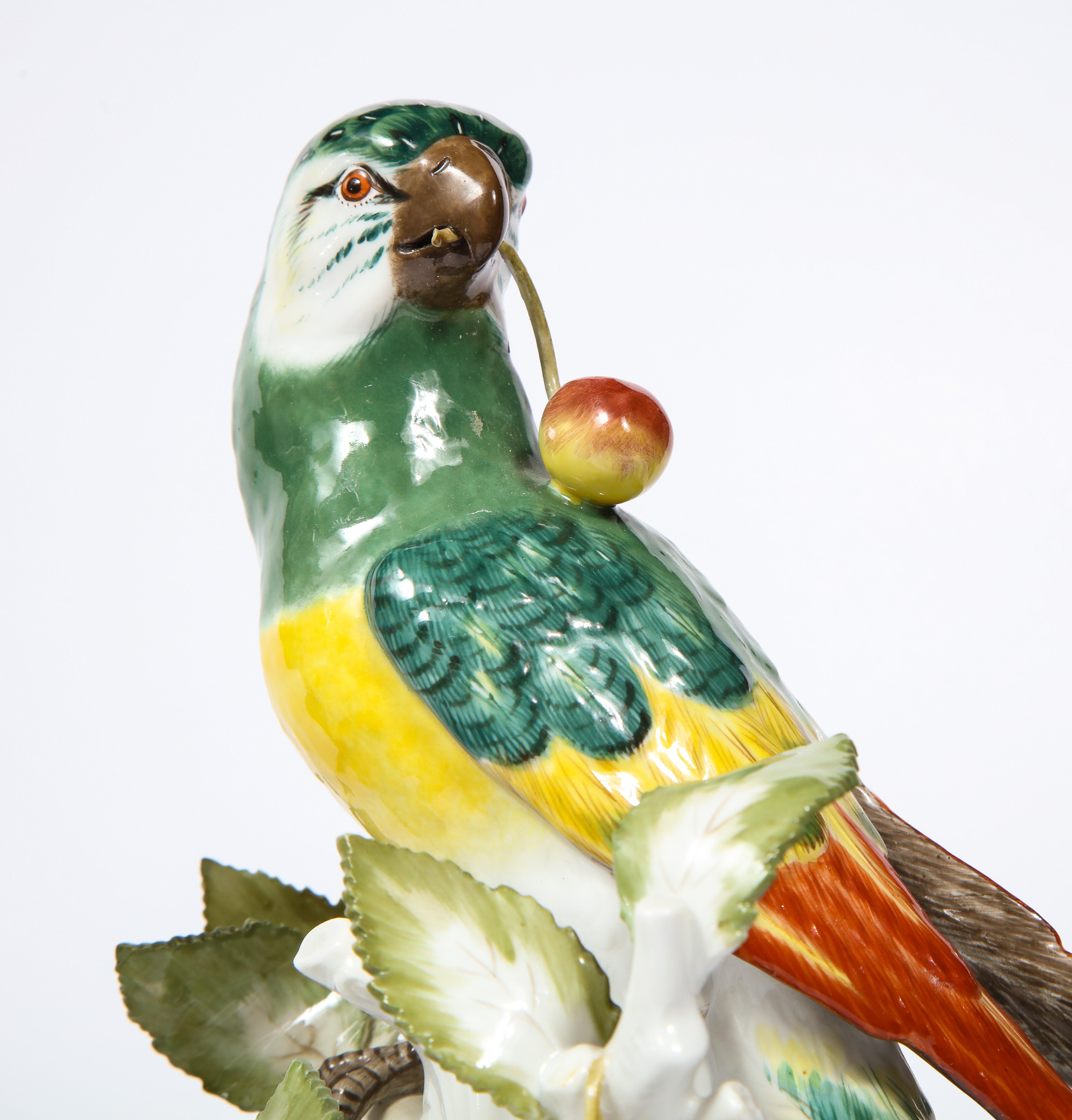 19th Century Pair of Meissen Porcelain Figures of Parrots with Cherries, Insects and Flowers