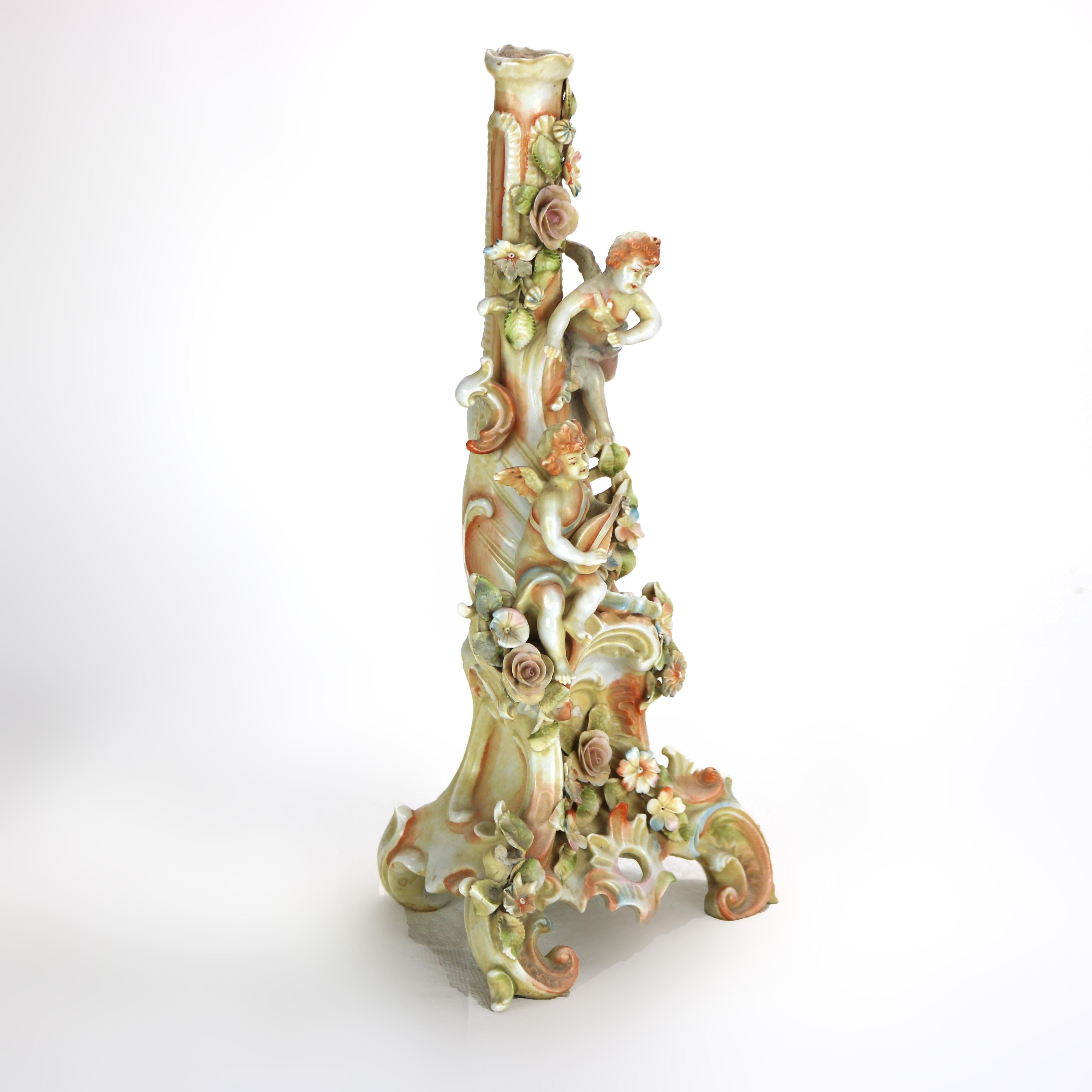 Pair of Meissen School Hand Painted Figural Porcelain Cherub Candlesticks 19thC.   
14 3/8