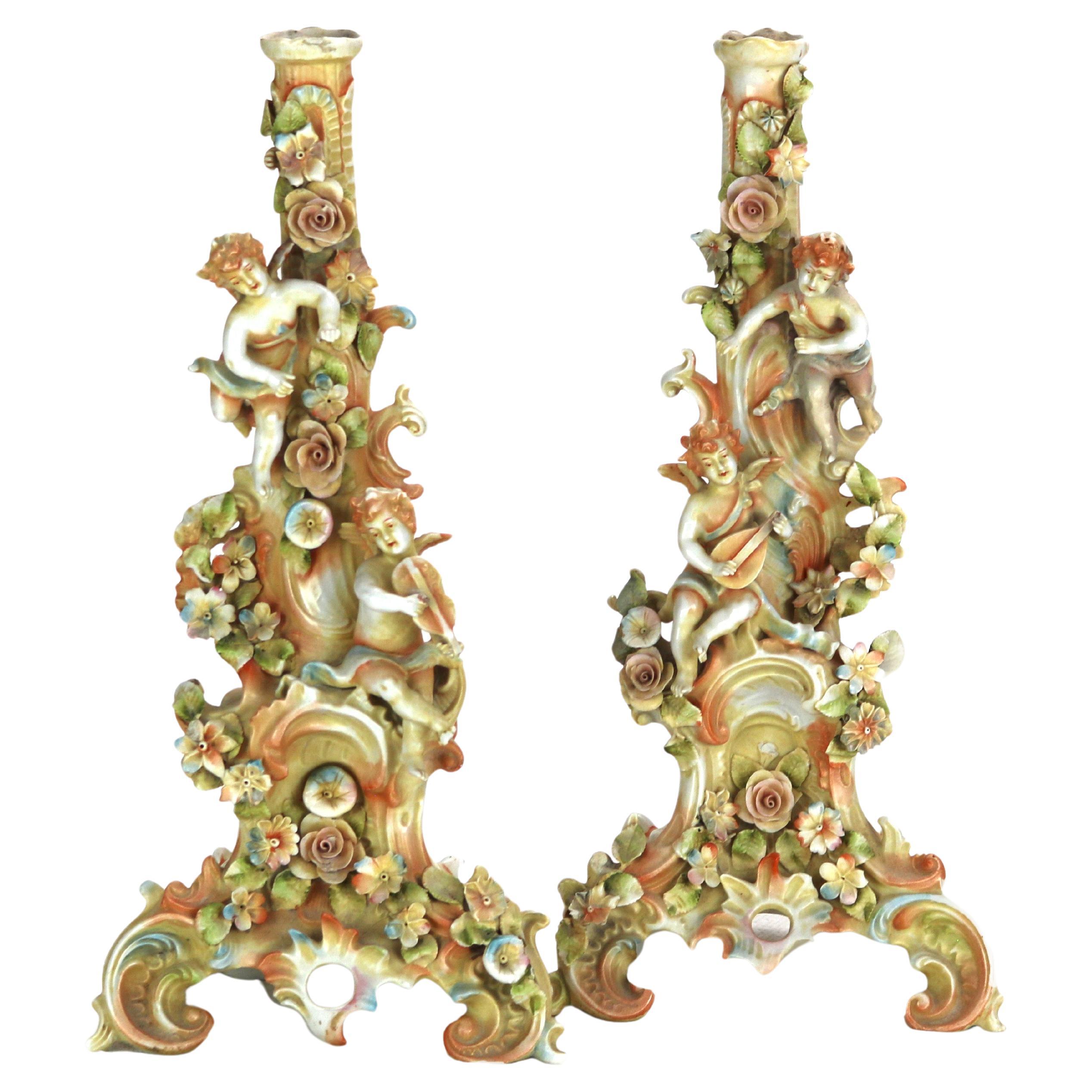 Pair of Meissen School Hand Painted Figural Porcelain Cherub Candlesticks 19thC For Sale