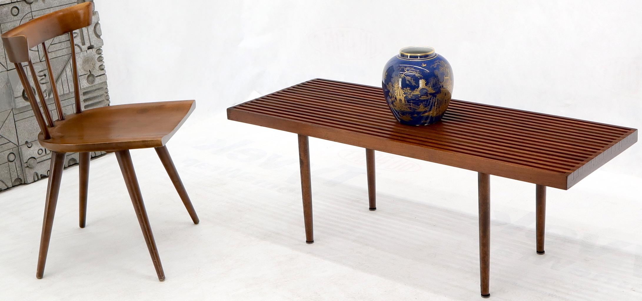 Pair of solid walnut Mid-Century Modern slat wood benches by Mel Smilow.