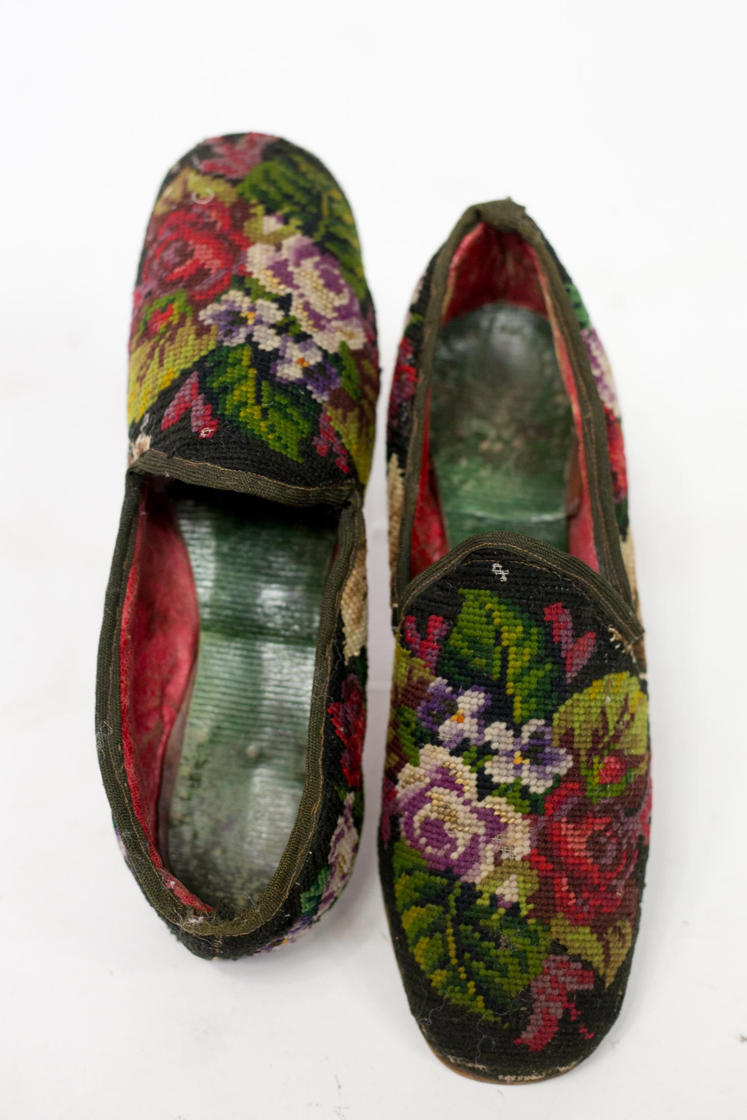 Circa 1860/1880

France

Rare pair of Second Empire french period male slippers for the Fumoir or indoor reception and interiors. Beautiful embroidery in polychrome woolen tapestry on canvas decorated with bouquets of roses in profusion (small