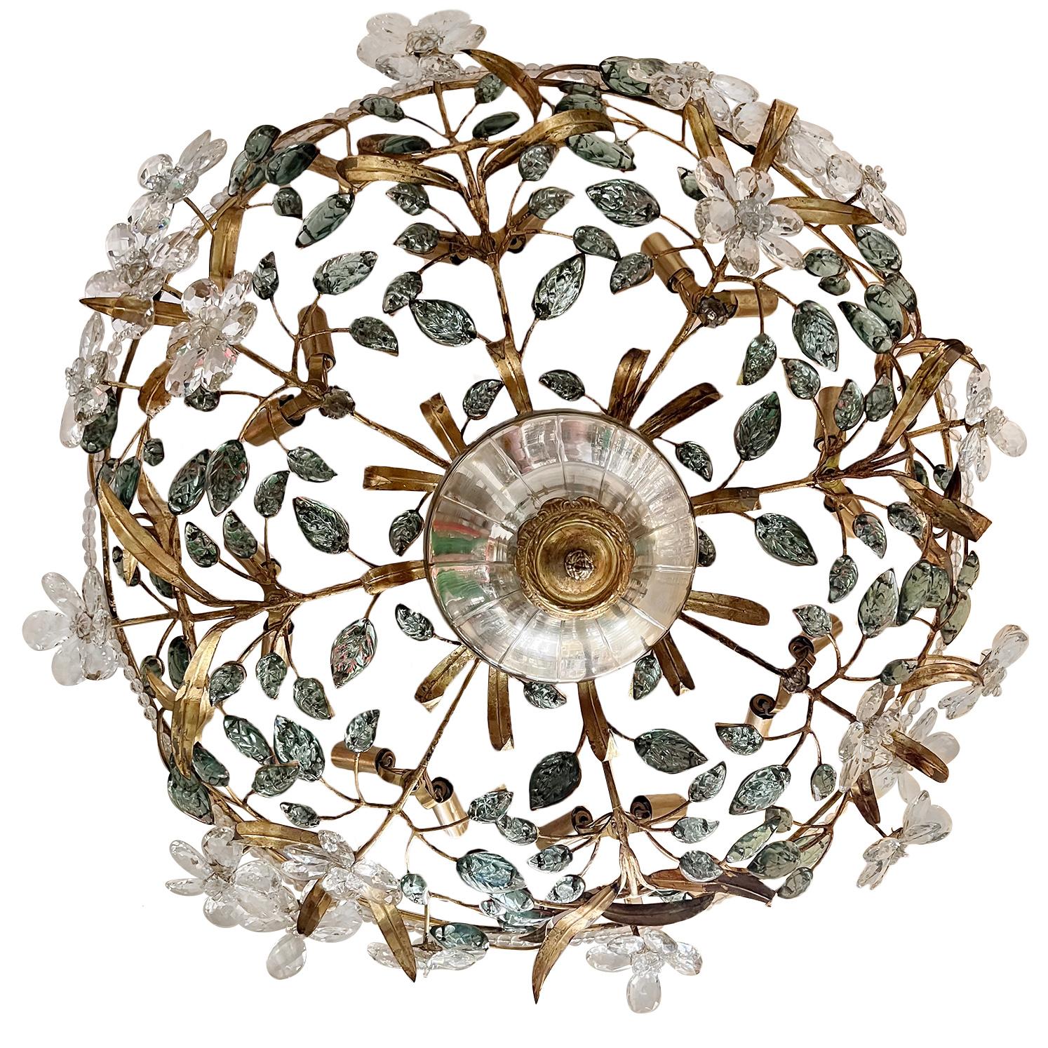A pair of circa 1950's French mercury glass and patinated metal light fixture with molded glass leaves and flowers and with 10 interior lights. Sold individually.

Measurements:
Diameter: 31