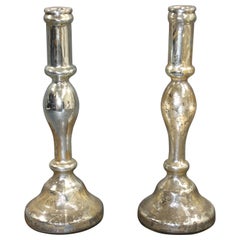 Paire de bougeoirs en verre mercuré argenté