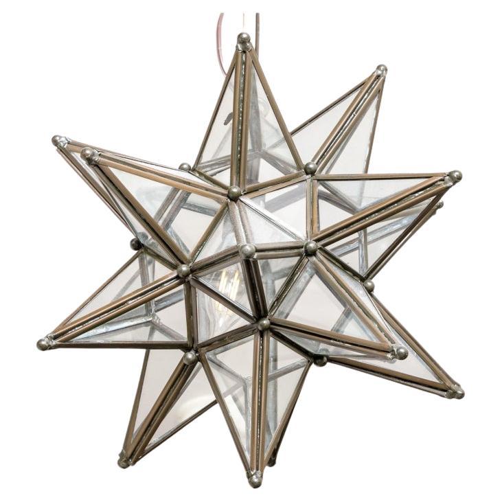 Pair Of Metal and Glass Moravian Star Lighting Fixtures In Good Condition For Sale In Bridgeport, CT