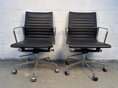 Pair of Metal and Leather Rolling Herman Miller Style Office Chairs