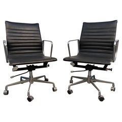 Pair of Metal and Leather Rolling Herman Miller Style Office Chairs