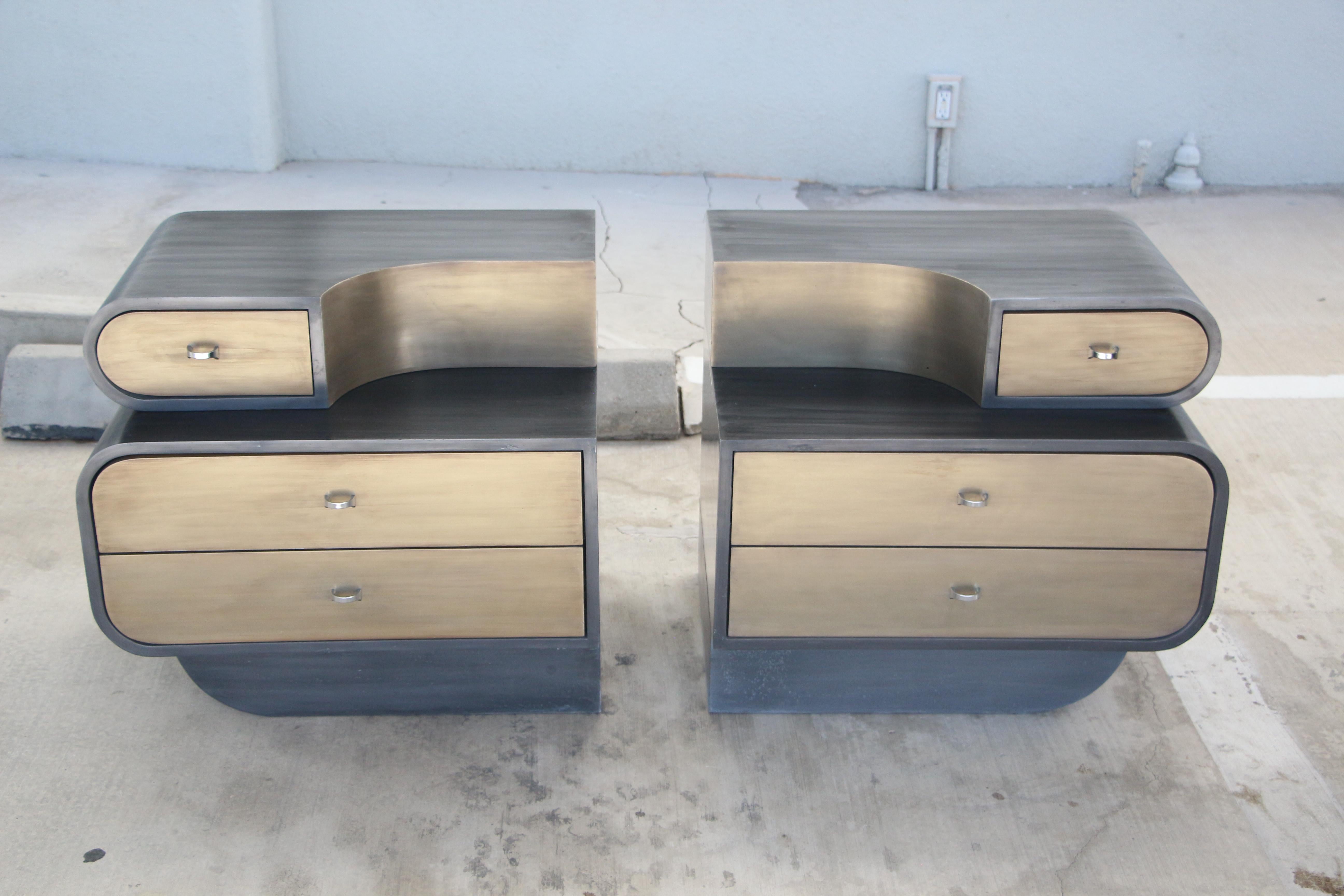 A beautiful pair of Bridges over Time Originals Nightstands. They can also serve as end tables. These are vintage pieces that have been re-done and re-imagned. These feature an iron coated frame, with a brass coated drawer fronts nice chrome pulls.