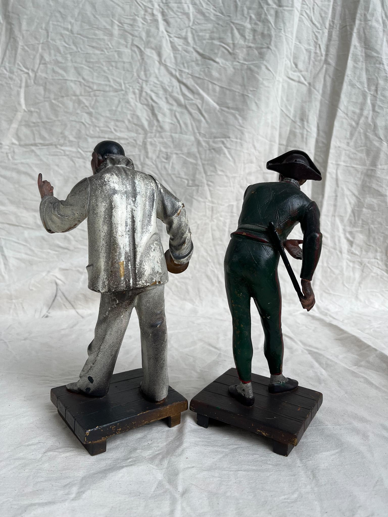 Pair of metal figures. Pierrot and Pantaleon. 19th century France.