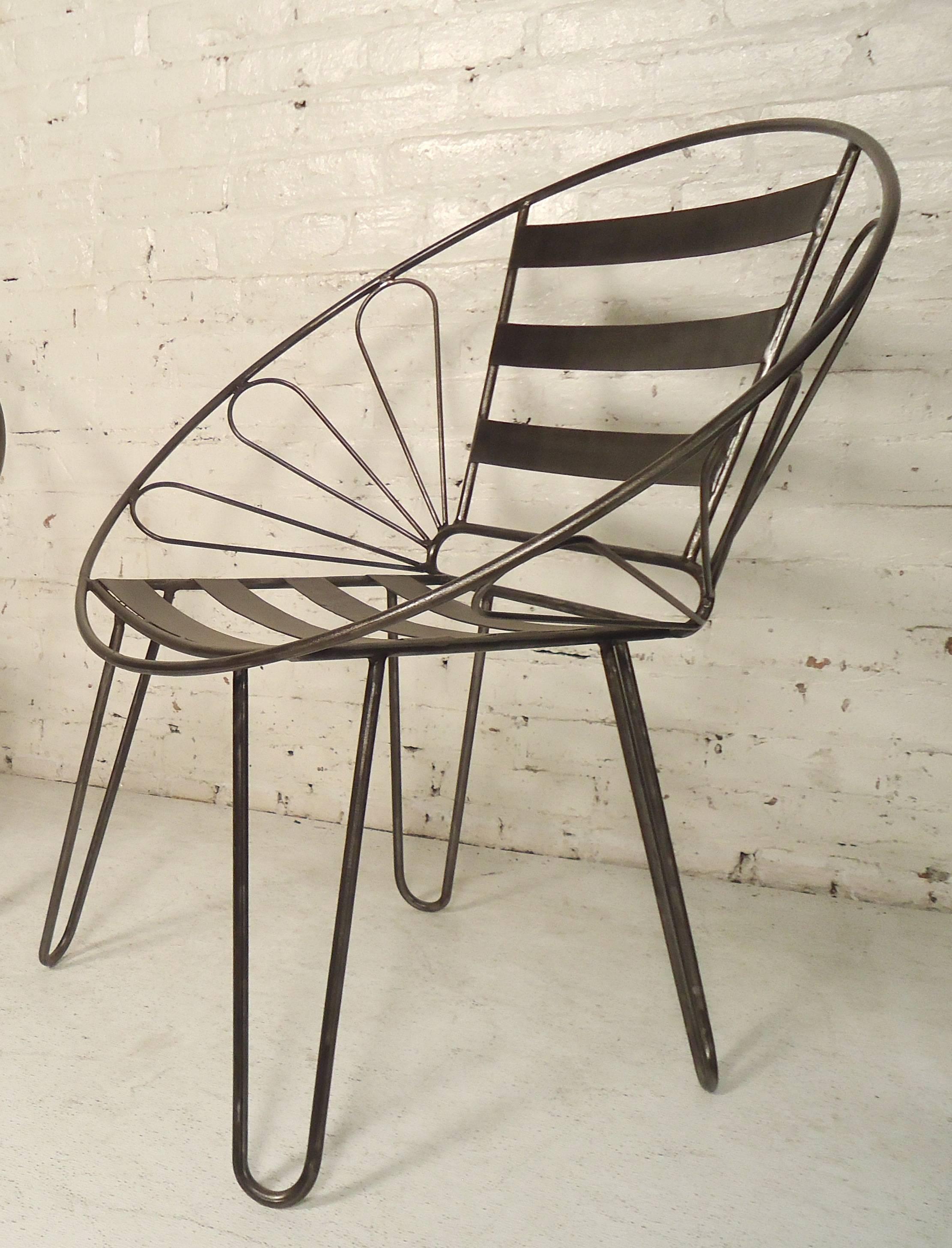 Stylish indoor/outdoor chairs restored in a bare metal style finish. Strong metal construction with large hoop frame and hair pin legs.

(Please confirm item location NY or NJ with dealer).
 