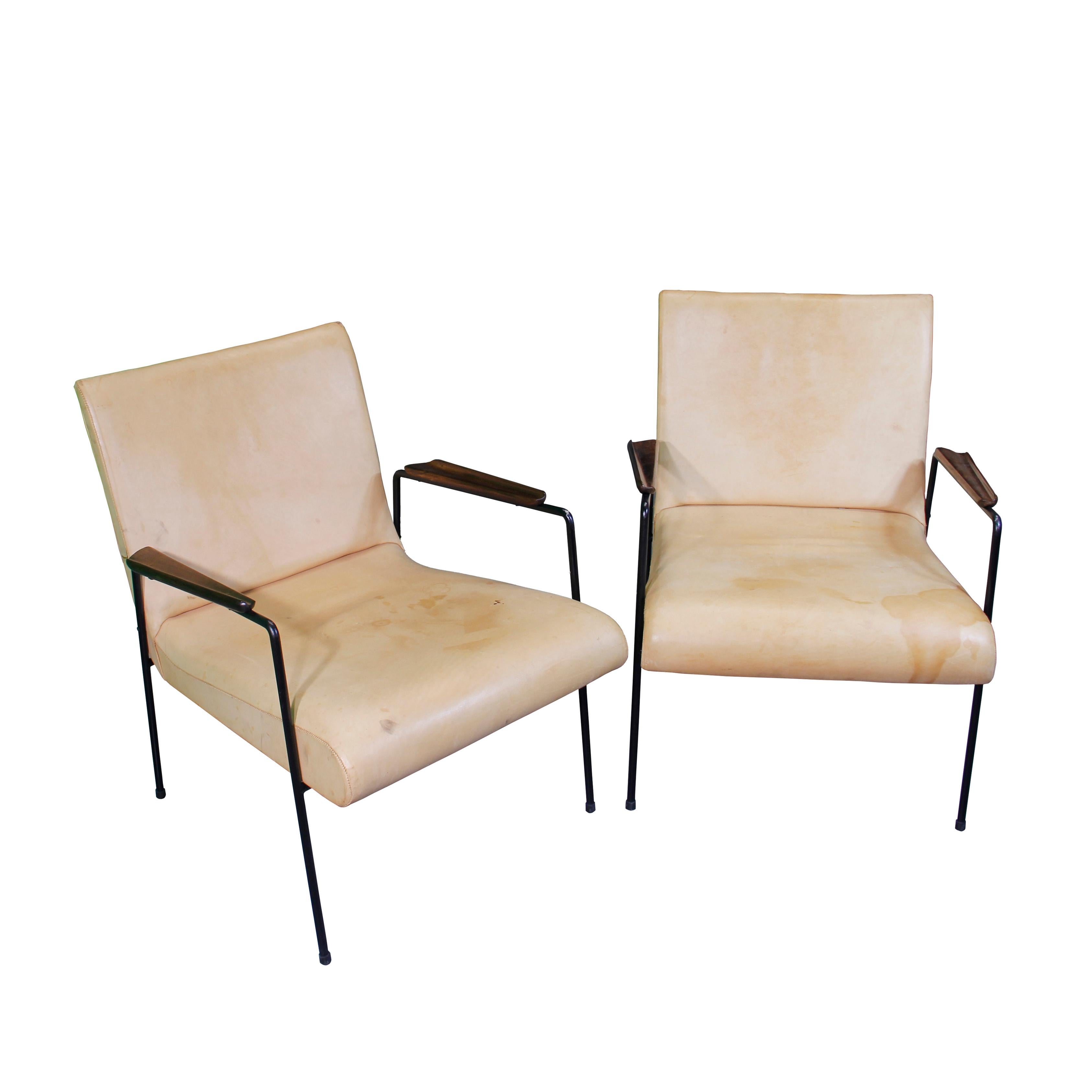 Joaquim Tenreiro, leve armchairs (light) - 1960s. Metal version. Manufactured by Tenreiro Móveis e Decorações. Metal frame, armrests in Jacarandá. Metal shows signs of age but otherwise is in great condition. 
We kept the chairs in their original