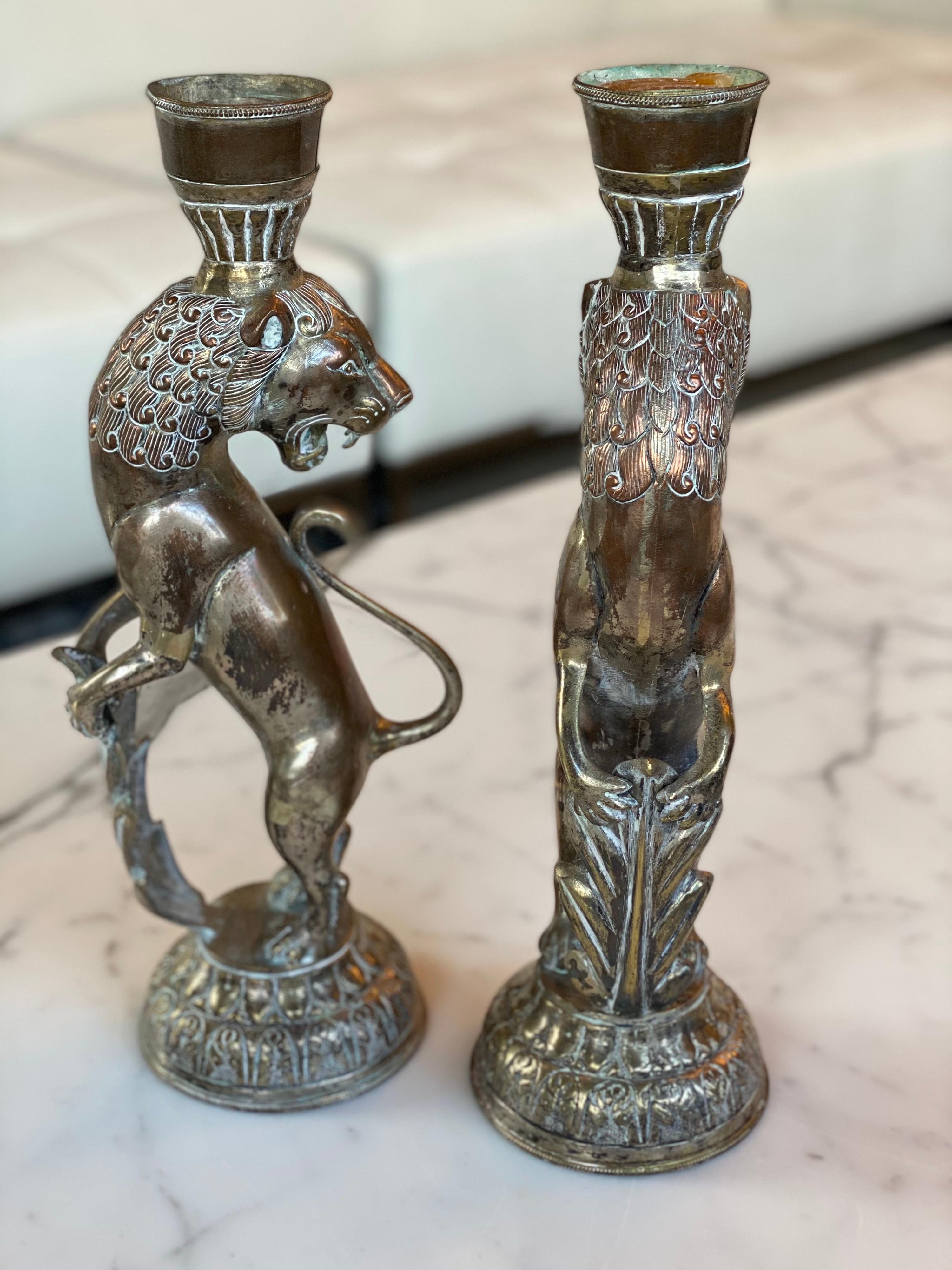 Unknown Pair of Metal Lion Candlesticks