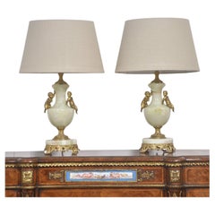 Pair of metal mounted onyx table lamps