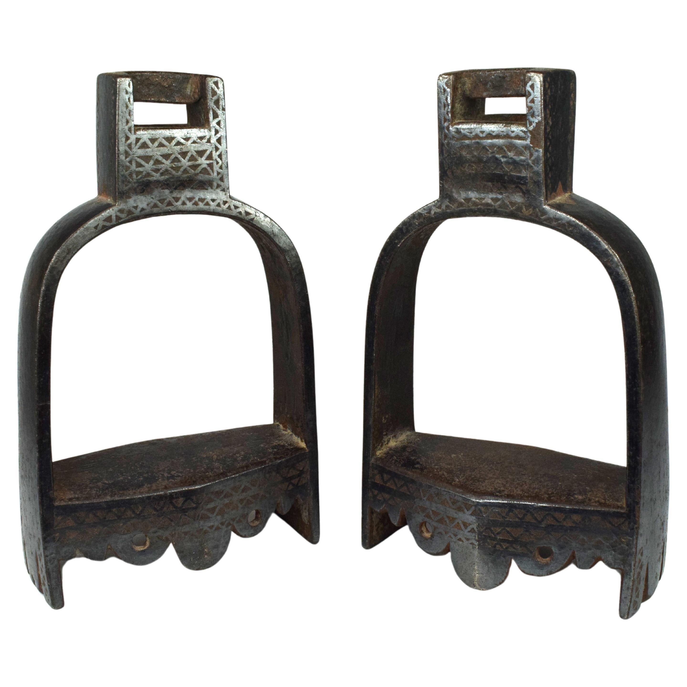 Pair of Metal Mughal Horse Stirrups with Silver Inlay, 19th Century For Sale