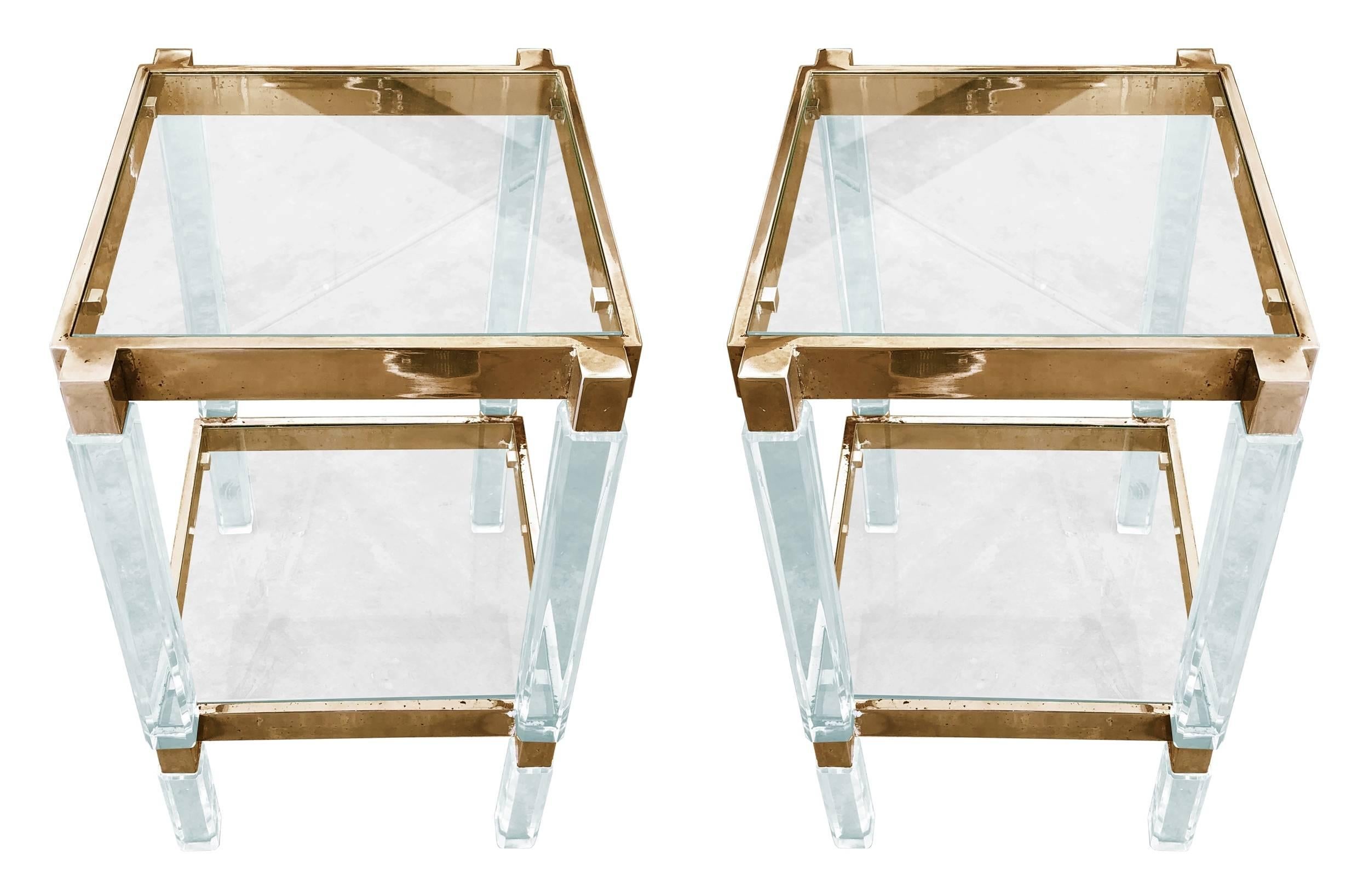 Pair of vintage metric side table is brass and Lucite by Charles Hollis Jones.
The pieces are in very good vintage condition, the Lucite and metal will be polished prior to shipping.
The metal can be plated to your choice of finish for an