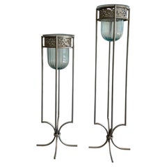 Pair of Mexican Aqua Blown Glass Vessels on Decorative Tole Metal Plant Stands