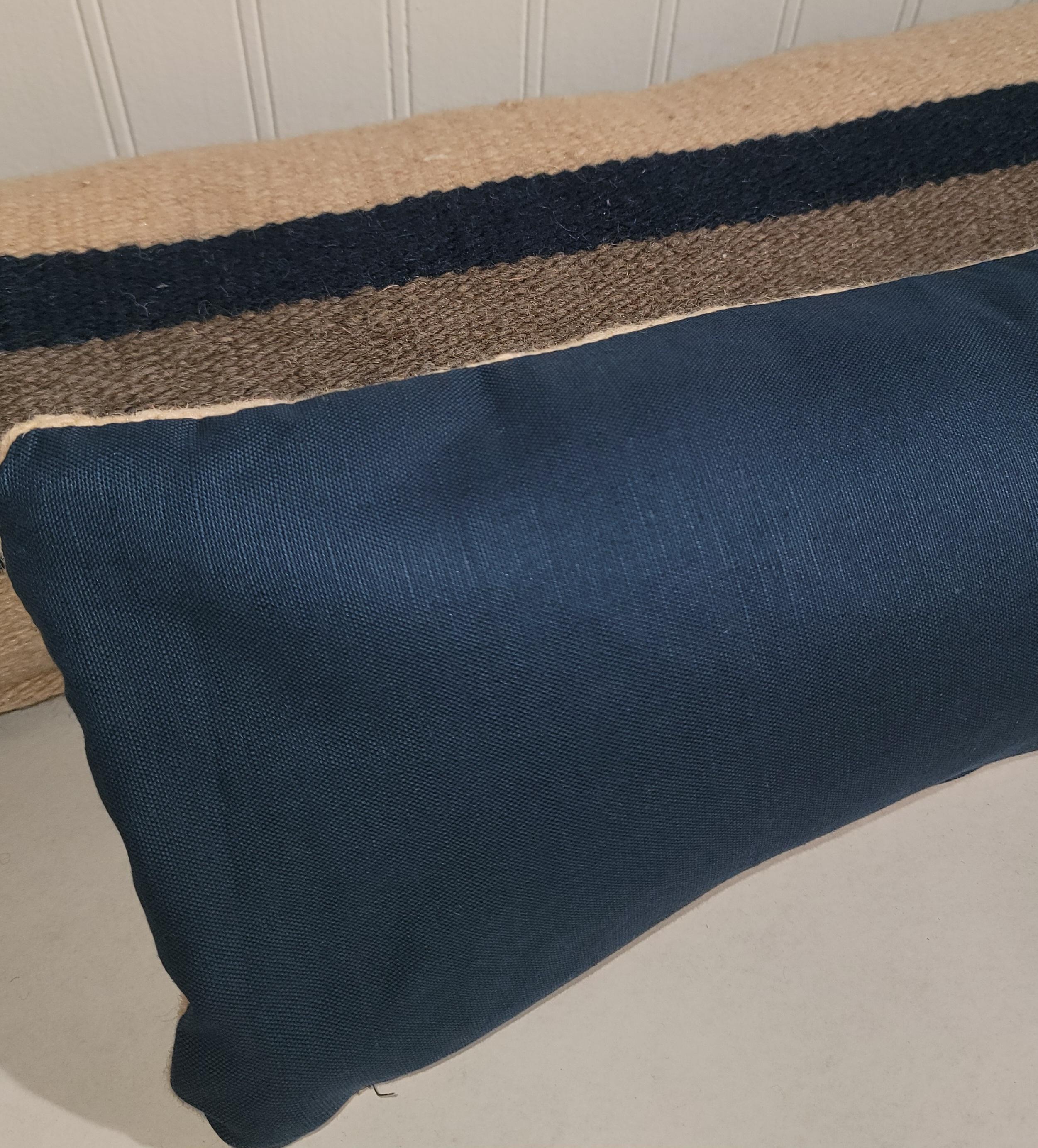 Elongated Mexican American weaving pillows with wonderful blue white and gray colors. The back is made from a vintage linen. This elongated pillow has a custom made down and feather insert. The stripes are clean lined and are subtle, do not