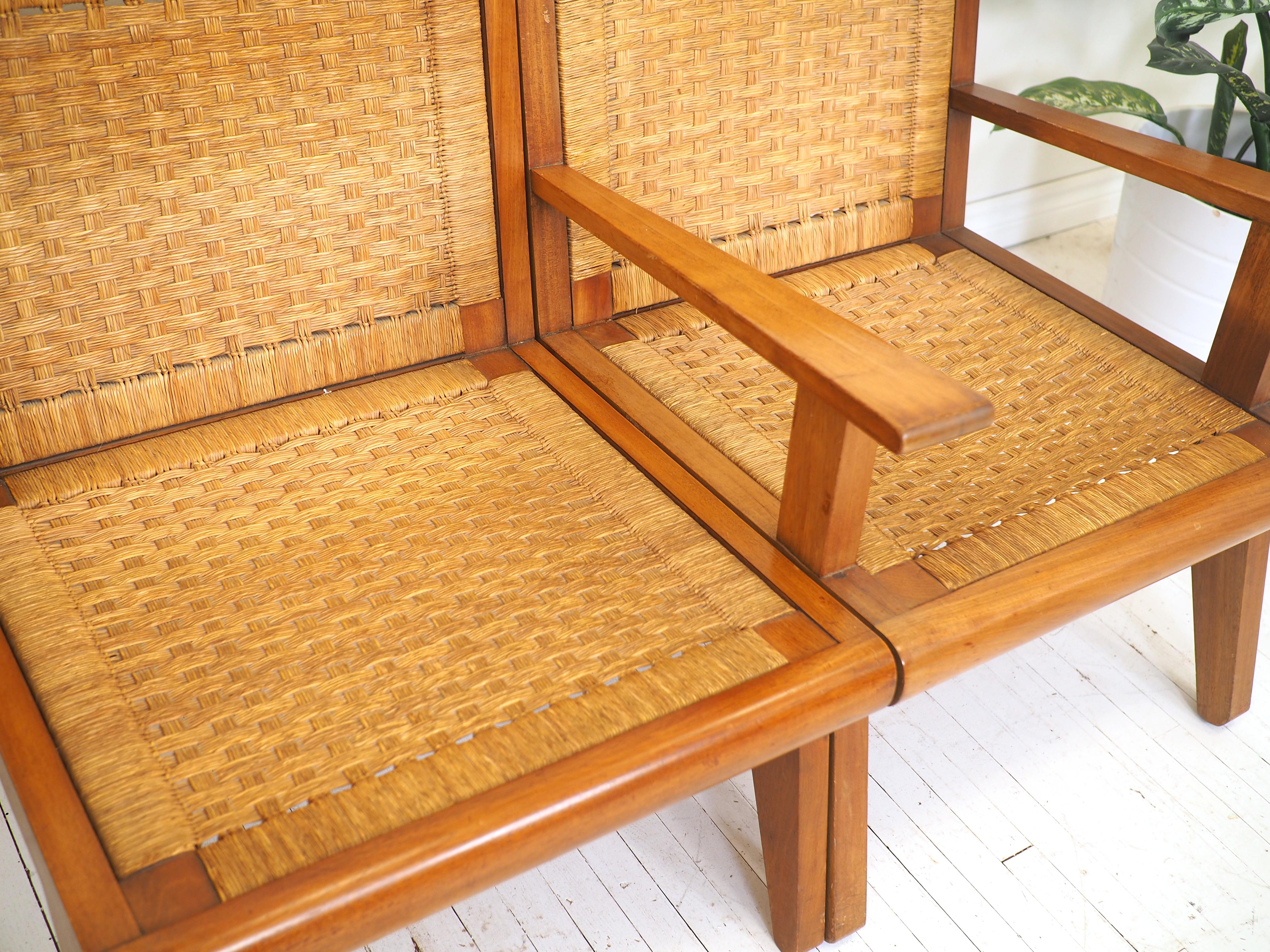 Beautiful pair of Mexican midcentury chairs with woven seats, made by Florida Muebles in Toluca, Mexico. 

Original owner attests to purchasing these in Mexico city in the late 1950s. They are strongly reminiscent of the Bauhaus-inspired designs