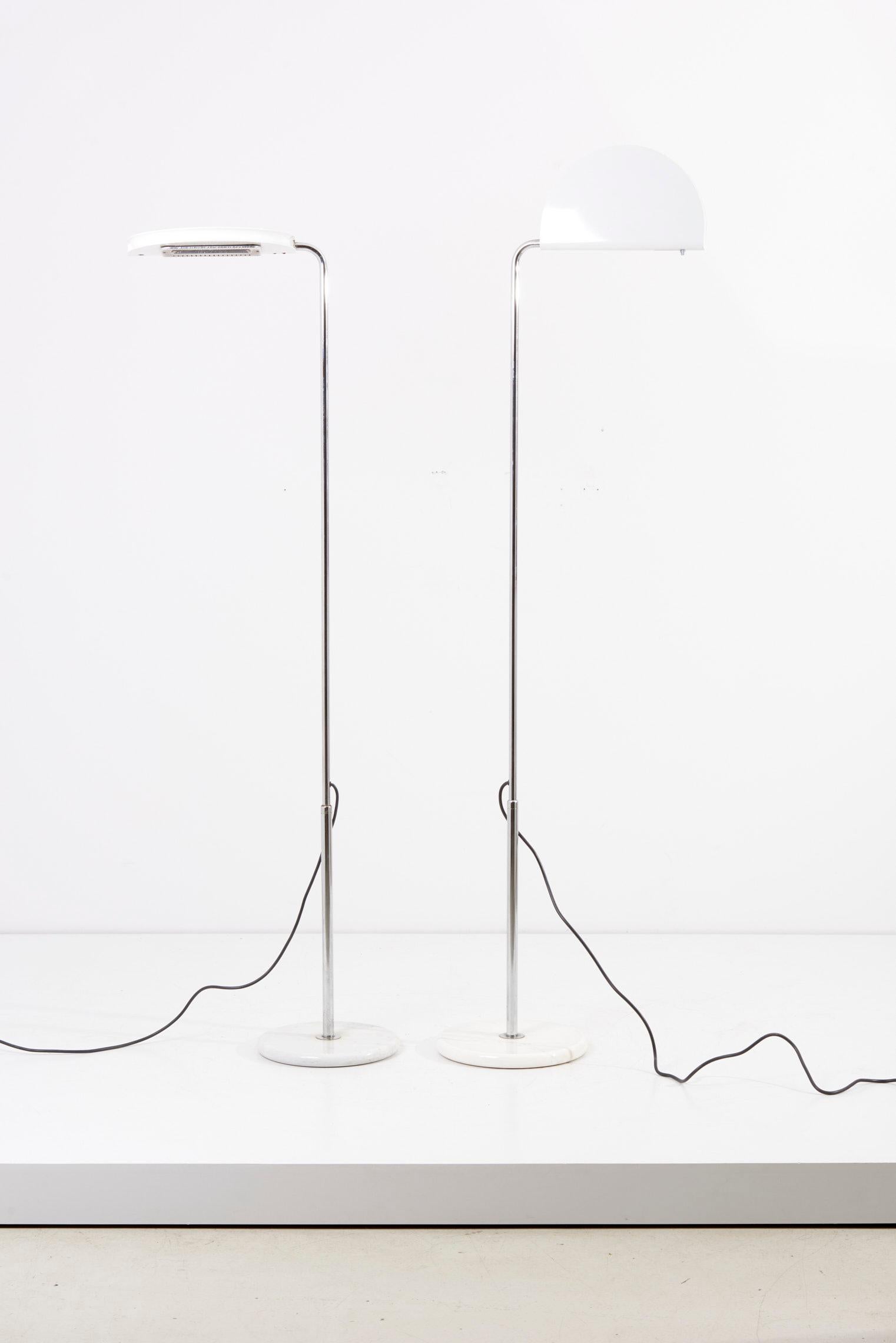 Pair of adjustable Mezzaluna floor lamps, designed in 1970s by Bruno Gecchelin and manufactured by Skipper in Italy.

? x E? socket / each.

Please note: Lamp should be fitted professionally in accordance to local requirements.