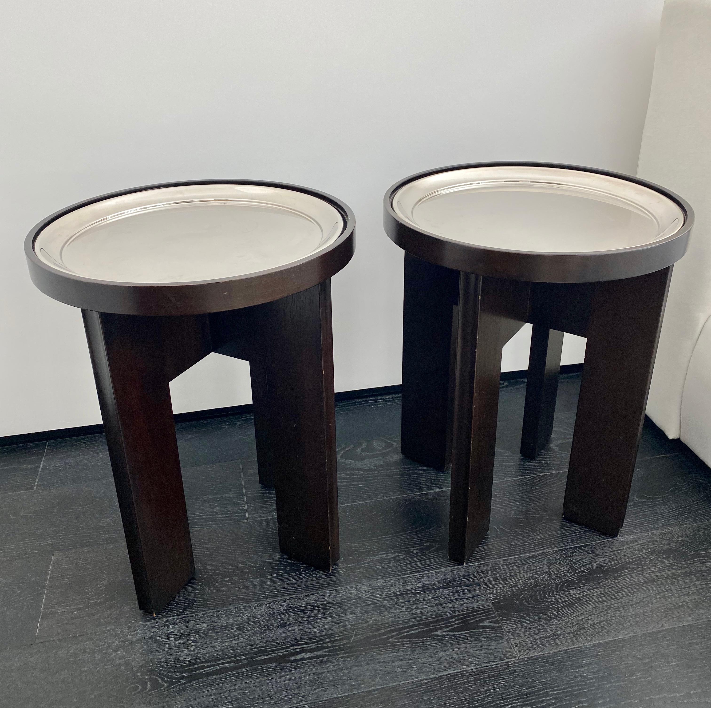 Holly Hunt side tables finished in walnut ebonized/standard sheen with removable tray is finished in silver. Small dings on legs and edge of finished top.