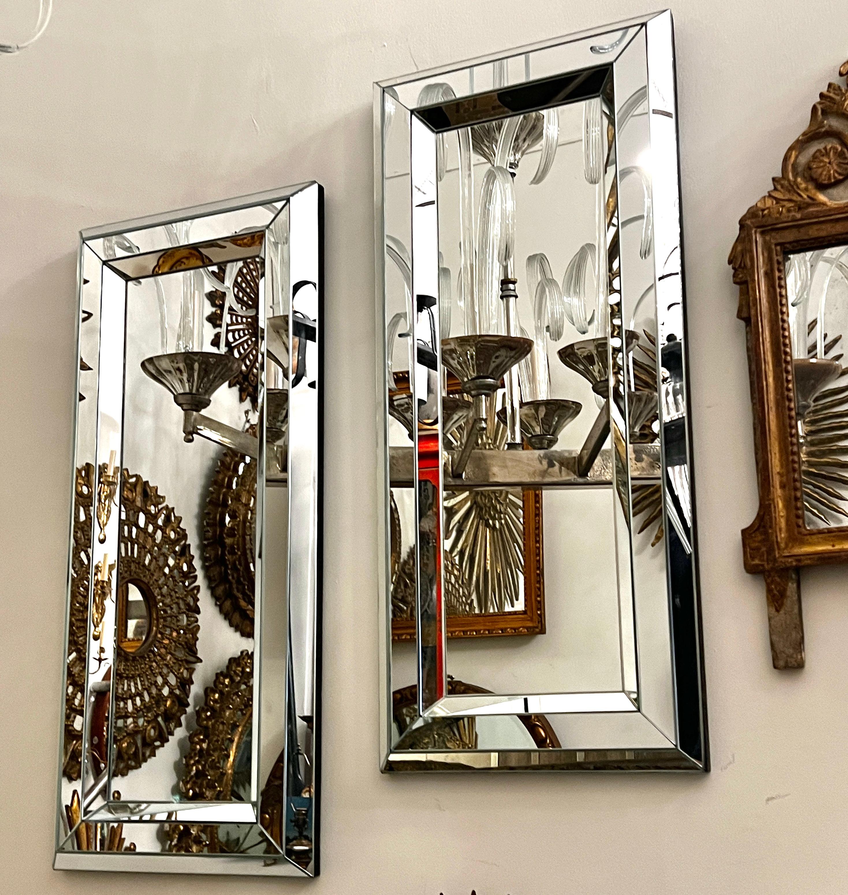Pair of circa 1970's French mirrors with geometric frame.

Measurements:
Height: 36