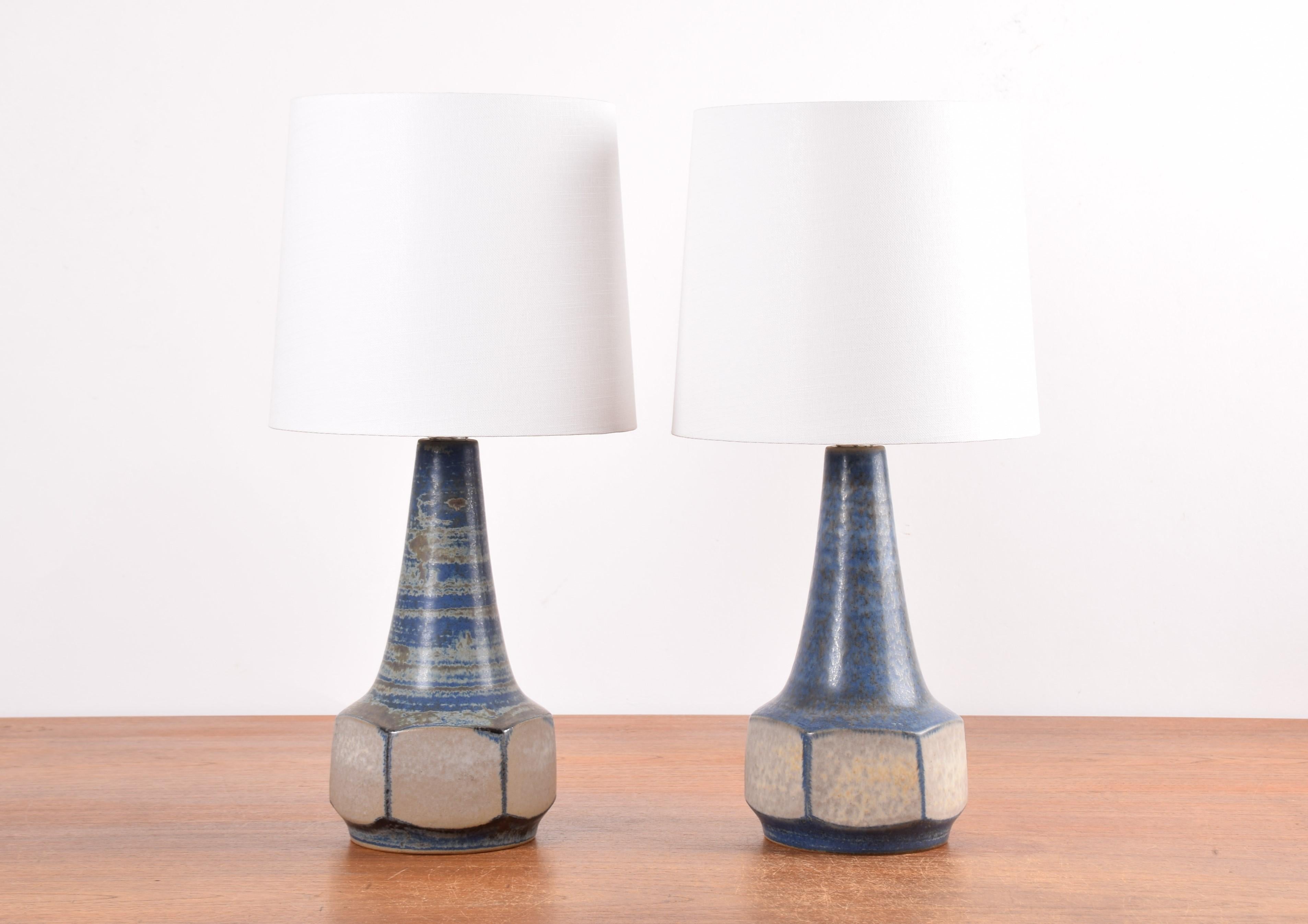 Pair of table lamps designed by Marianne Starck for Michael Andersen. Made ca 1960s or 1970s.
The lamps are made of stoneware and have a matte blue and gray glaze with some beige elements.
Due to the firing process the glaze has a unique