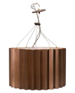 Pair Of Michael McEwen "Gear Suspension" Bronze Finished Chandeliers