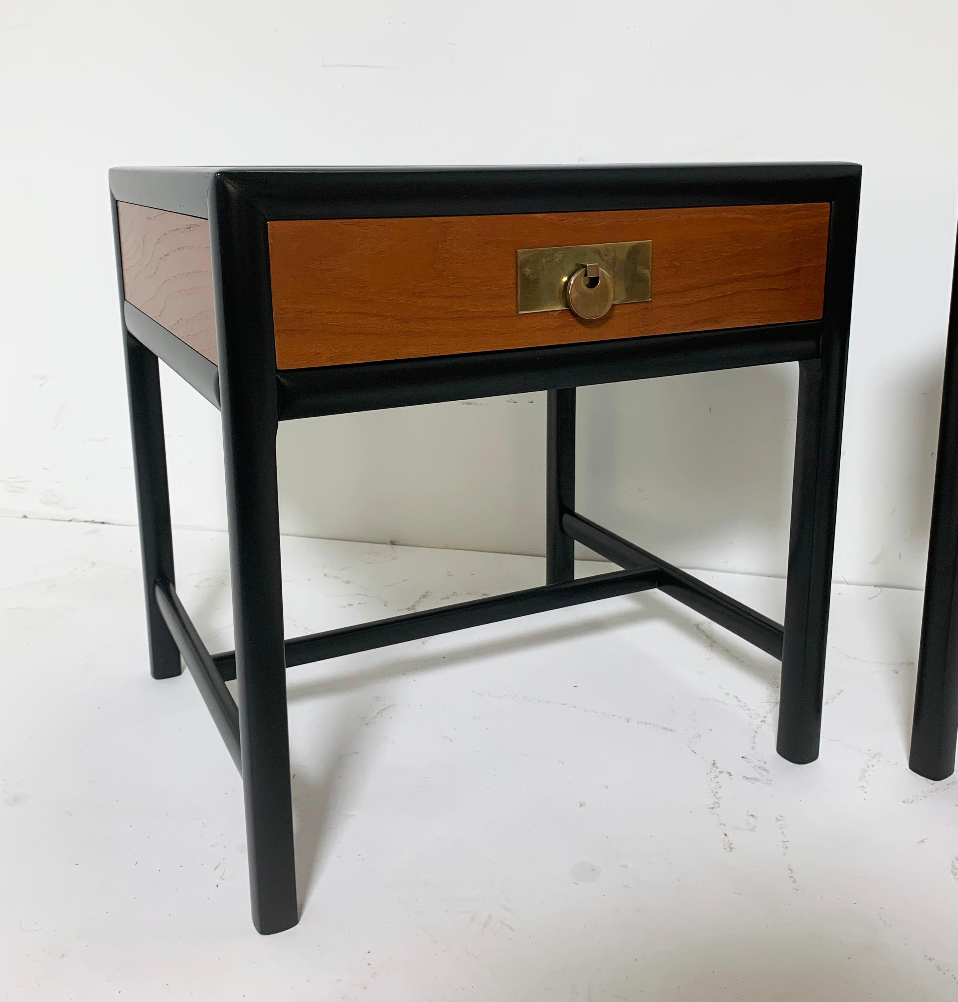 A pair of two-tone mahogany side tables by Michael Taylor for Baker Furniture’s “New World” collection, circa 1950s.