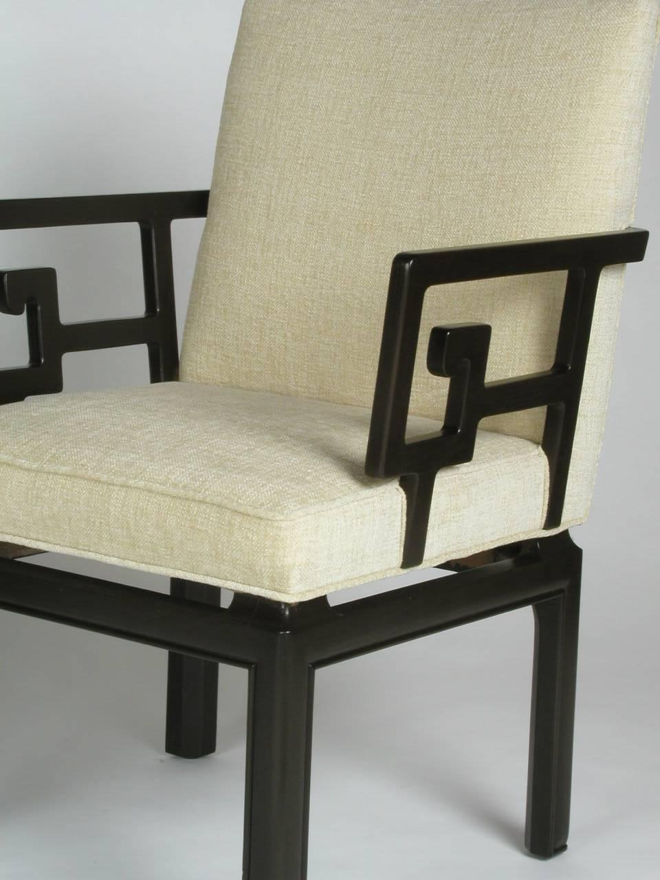 Vintage Michael Taylor Greek key armchairs for his Far East collection by Baker Furniture. In the style of James Mont, with stylized Greek key arms and thick rounded legs. Includes frames refinished. Current set shown is sold, another pair