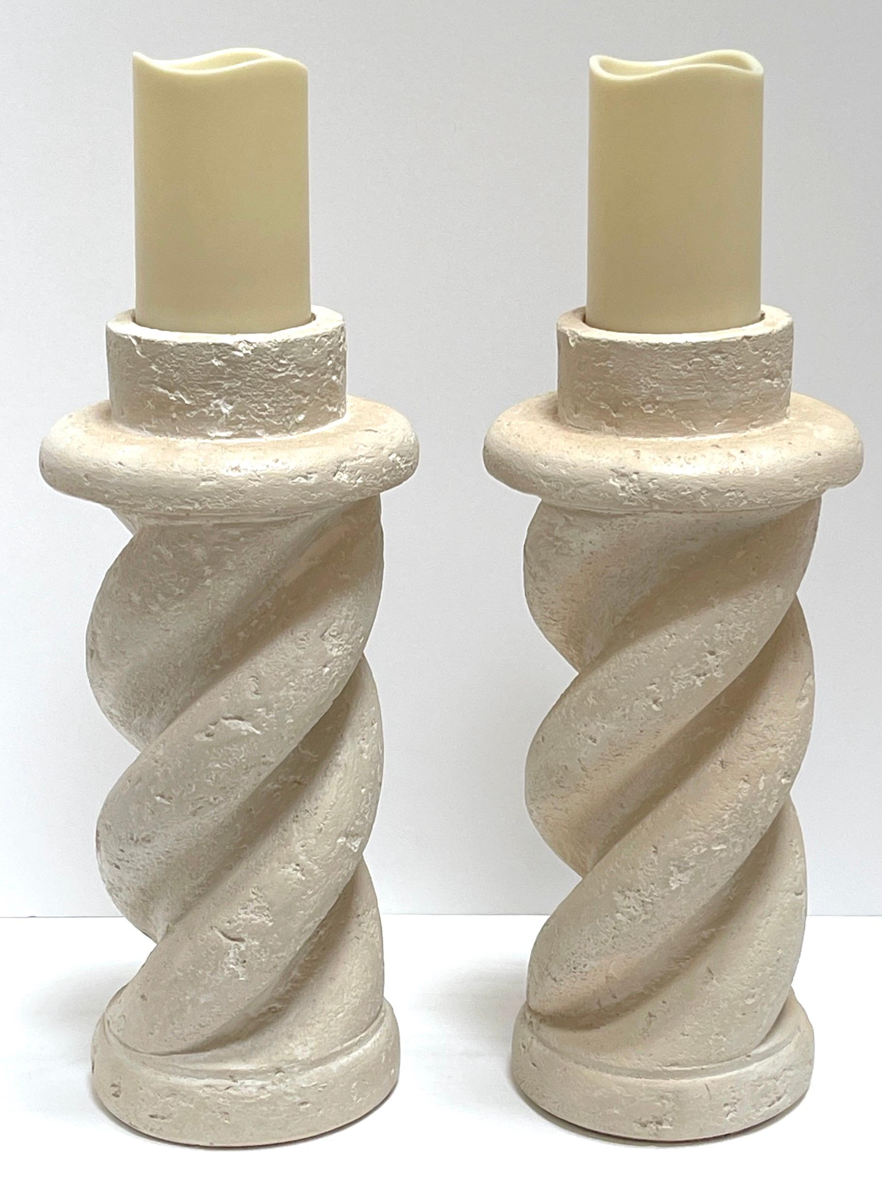 Pair of Michael Taylor Style Cast Plaster 'Coquina Stone' Spiral Candlesticks 
USA, Circa 1980s

We are please to offer this hard to find pair of Michael Taylor style candlesticks, Inspired by the iconic designs of renowned interior designer Michael