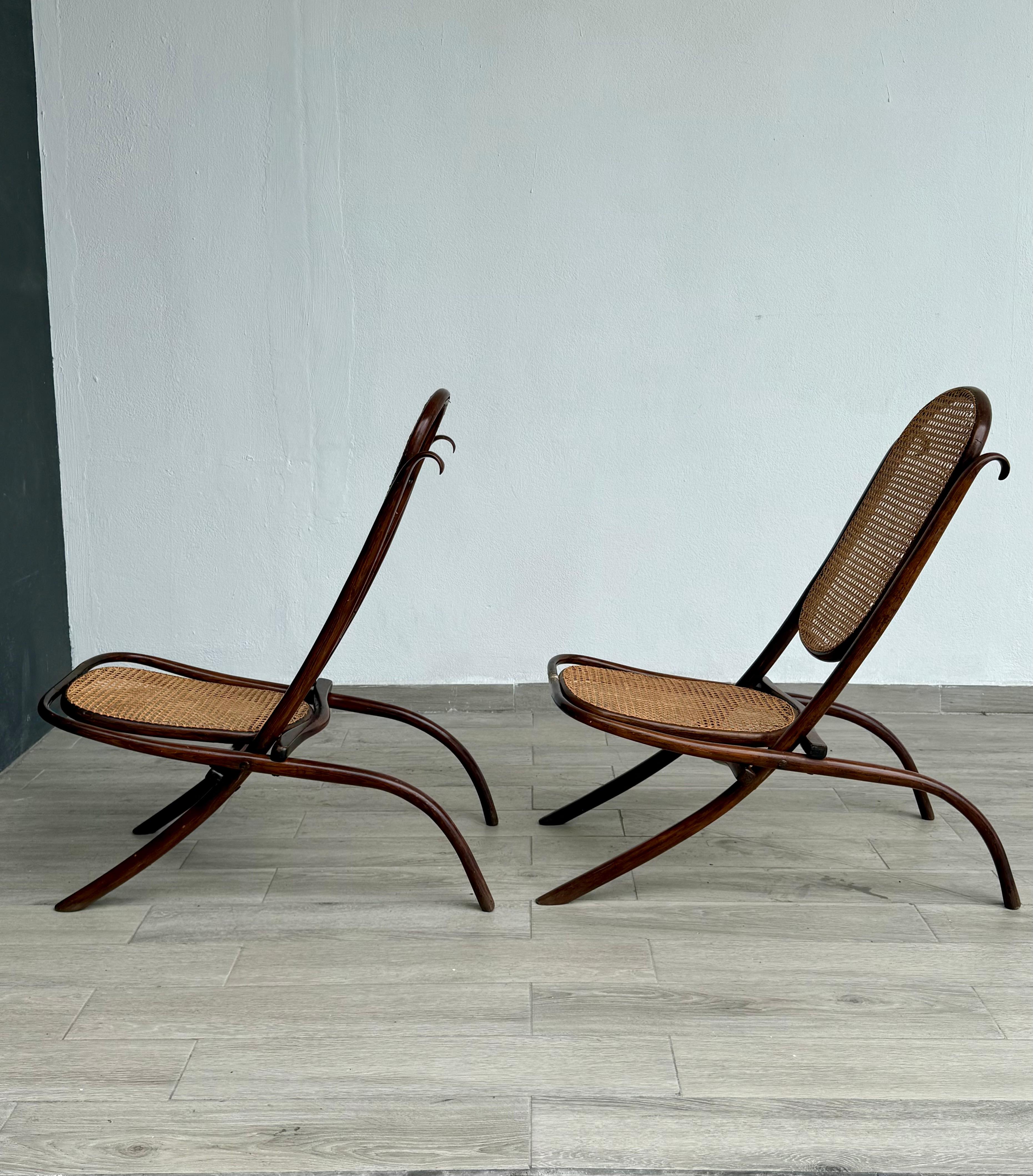 Model: Fireside chair model 1 (Kaminsessel) designed in 1866
The chairs need restoration, only the wood, the wicker cane webbing is in good condition on both pieces.
MOMA New York has this chair in its collection as well as the Stedelijk Museum in