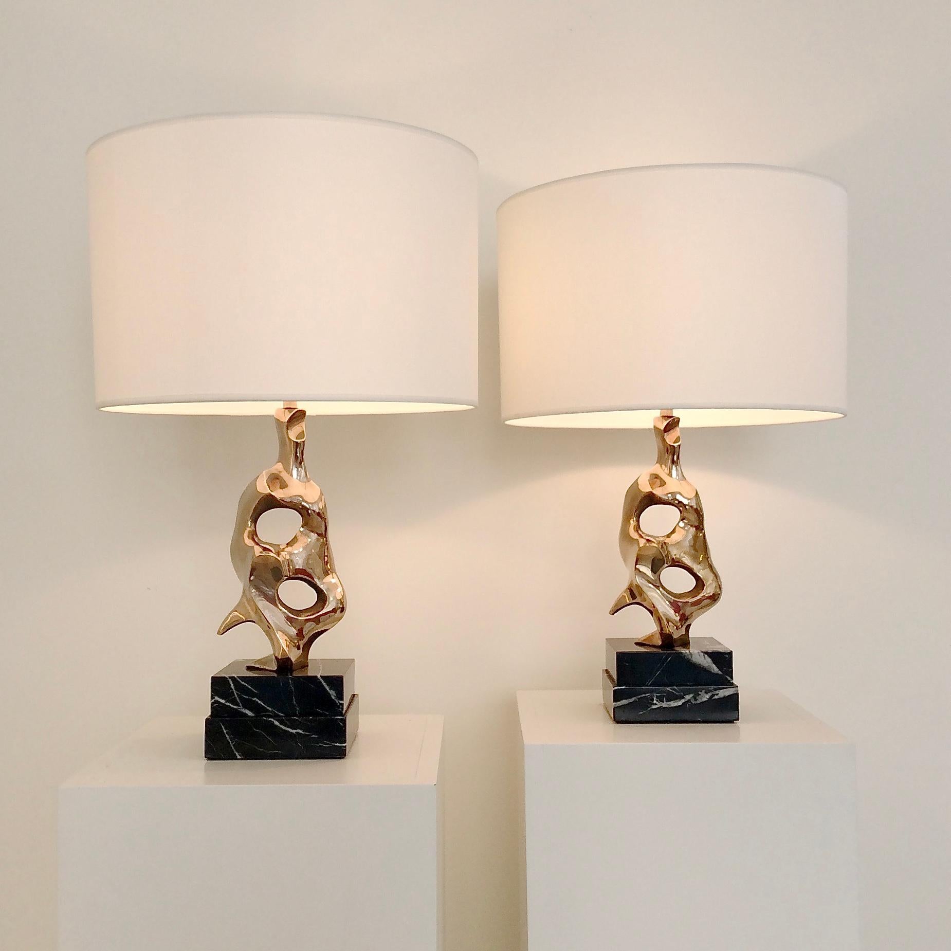 Michel Jaubert pair of sculptural table lamps, circa 1975, France.
Signed M.Jaubert.
Polished bronze, black marble, new fabric shade. Signed.
Dimensions: total height: 53 cm H, diameter: 35 cm.
Height of the bronze: 23 cm. Height of the shade: