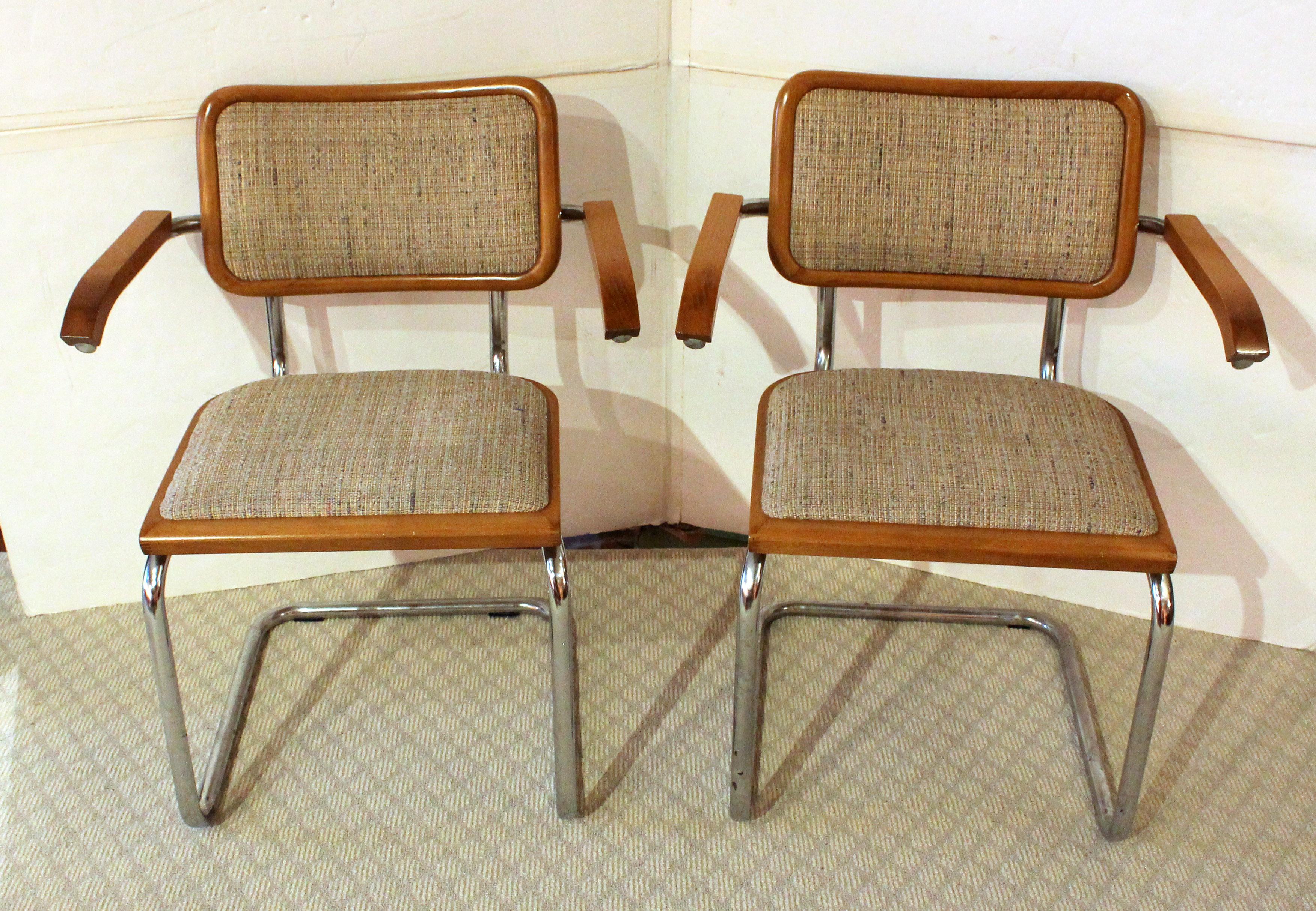 Mid century modern pair of Marcel Breuer Cesca Arm Chairs, mid-1970s, Italian. These have had only one owner. They lack the foot pads & are upholstered in rough woven period style fabric. Original 