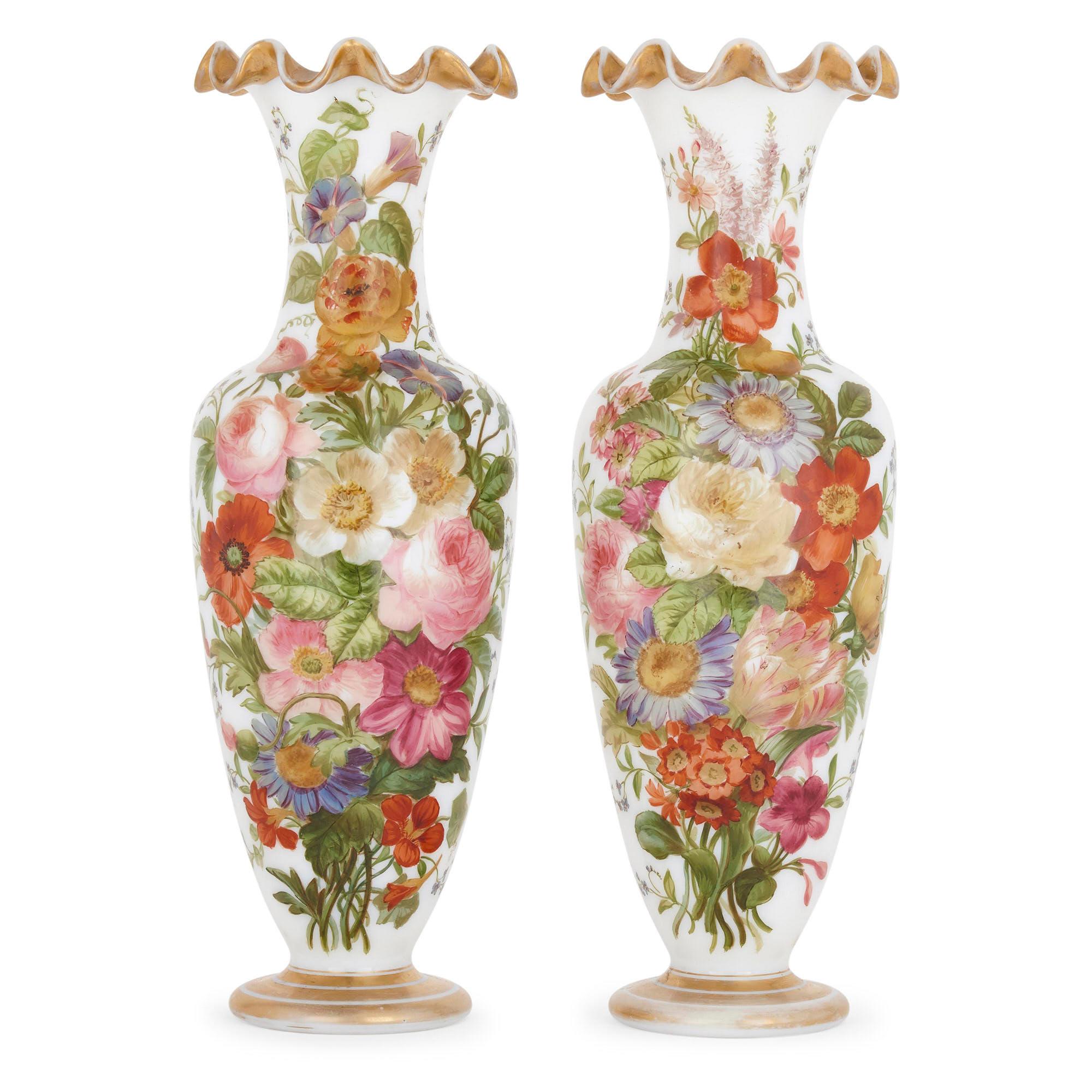 Pair of mid-19th century baccarat enameled glass vases
French, circa 1850
Measures: Height 35cm, diameter 12cm

Attributed to the famed designer and painter Jean François Robert (French, fl. 1843-1855), this pair of vases very finely show
