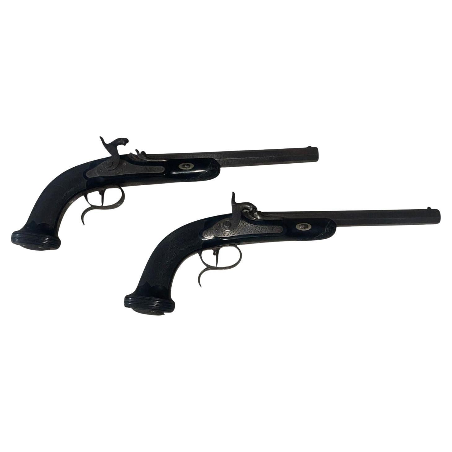 What are dueling pistols?