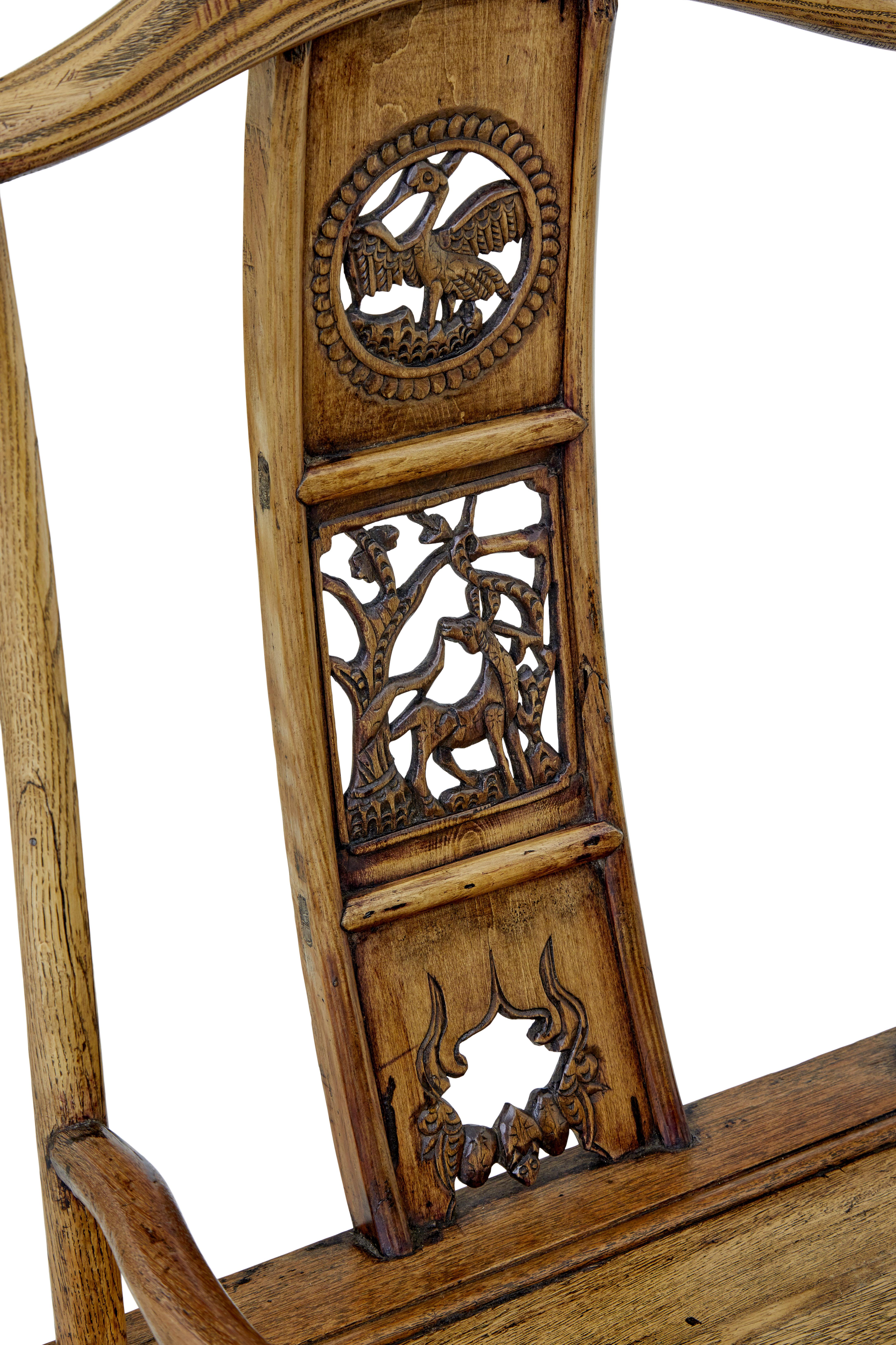 Hand-Carved Pair of mid 19th century carved elm Chinese yoke back armchairs For Sale